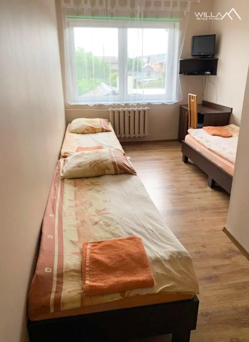 Bed in Willa Białe Piaski Pokoje i Noclegi Białogóra