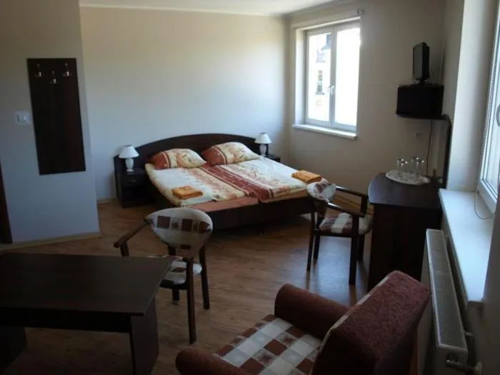 Bed in Willa Białe Piaski Pokoje i Noclegi Białogóra