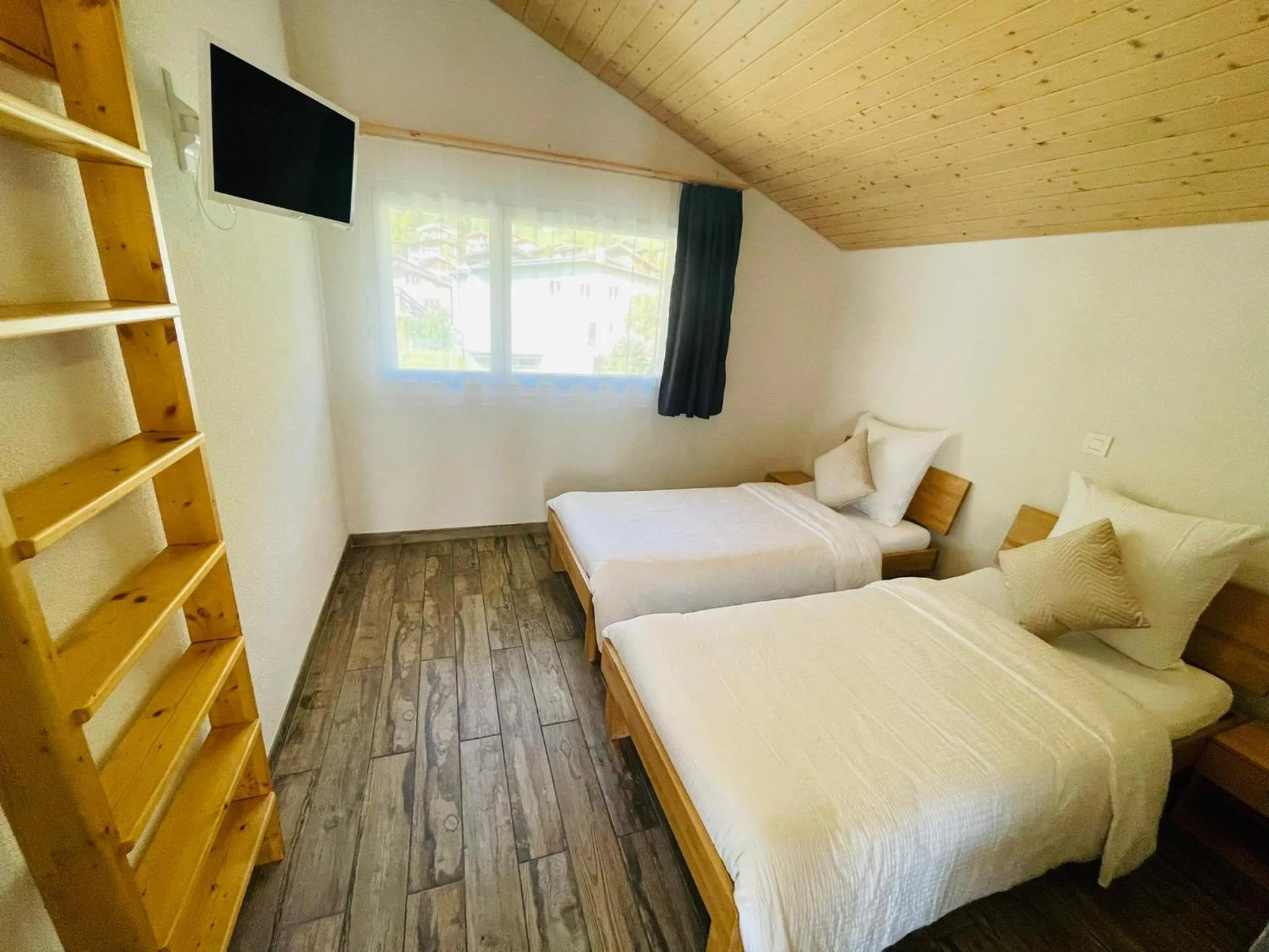 Bed in Swiss Chalet Holidays Ringgenberg