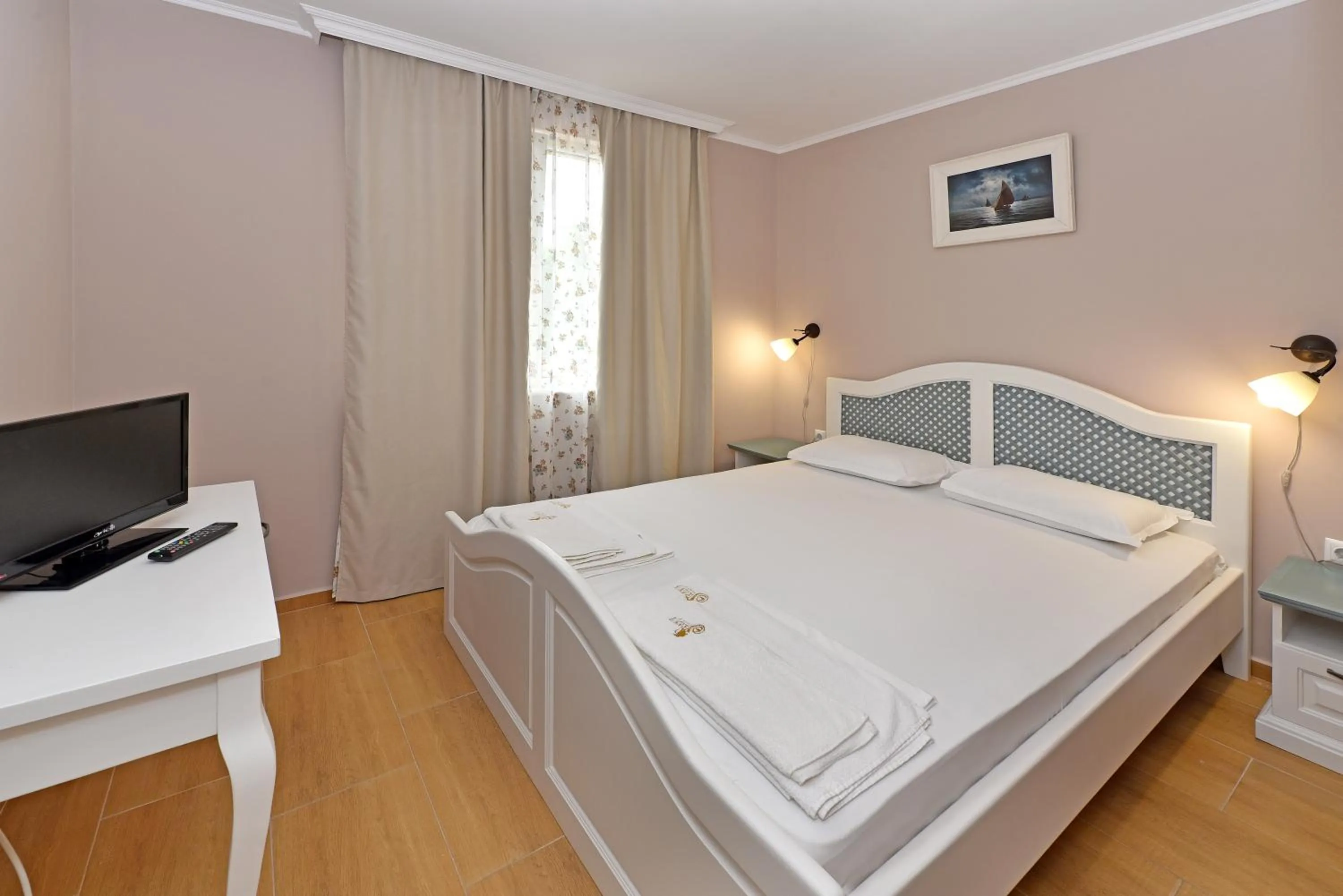 Bed in Sirena Palace Family Hotel