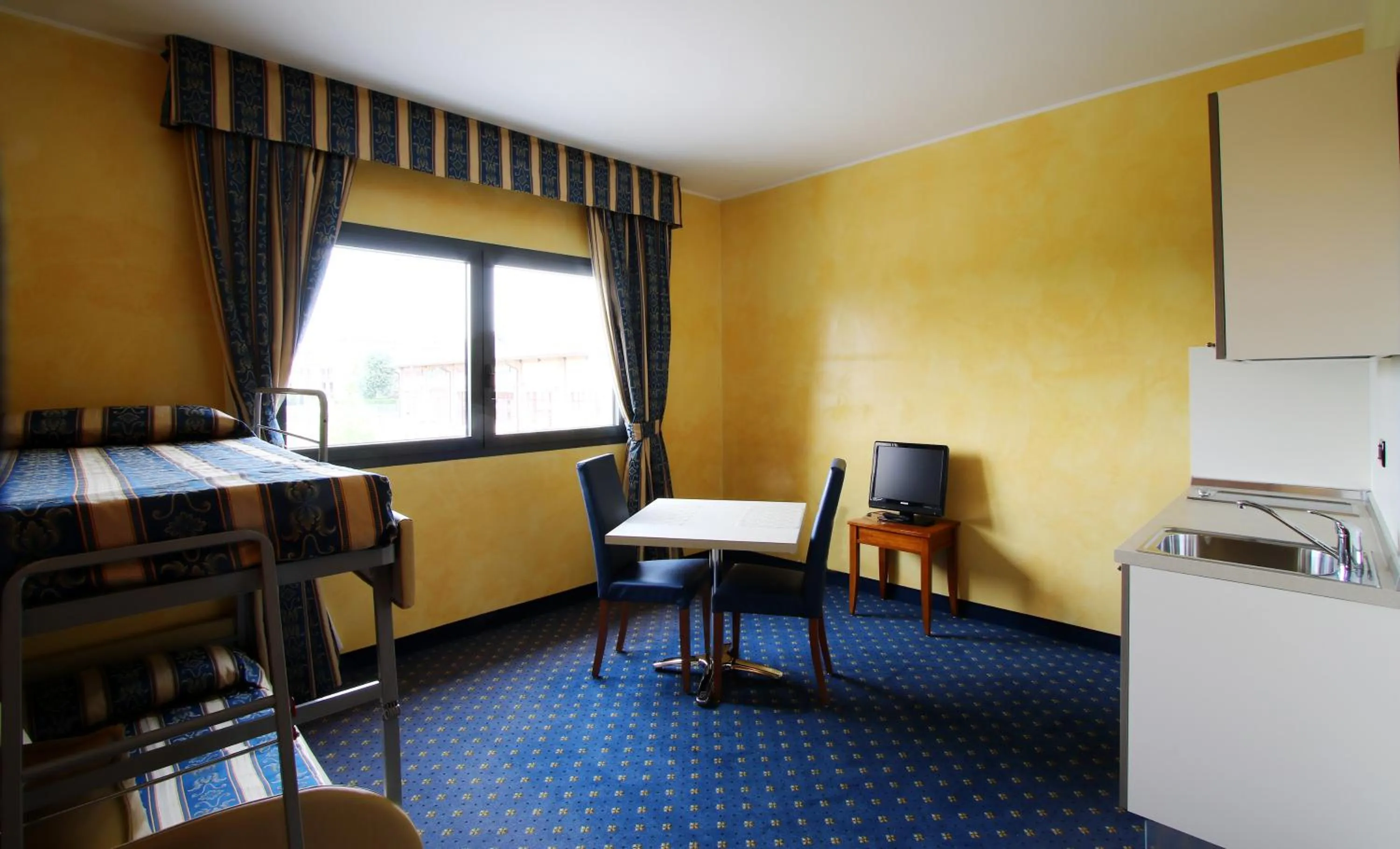 Kitchen or kitchenette in Hotel Riz B.B