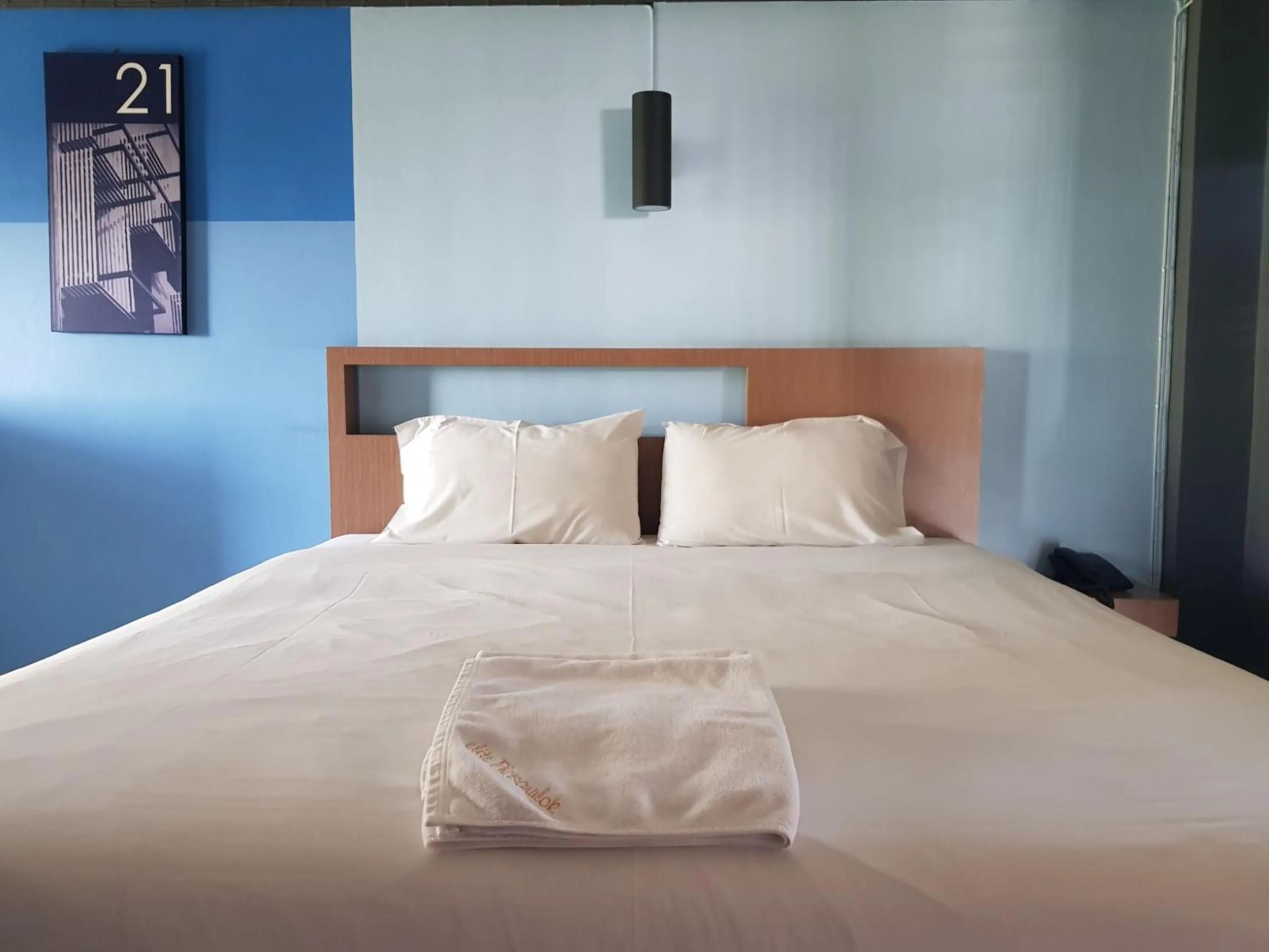 Photo of the whole room, Bed in Elite Residence Phitsanulok SHA