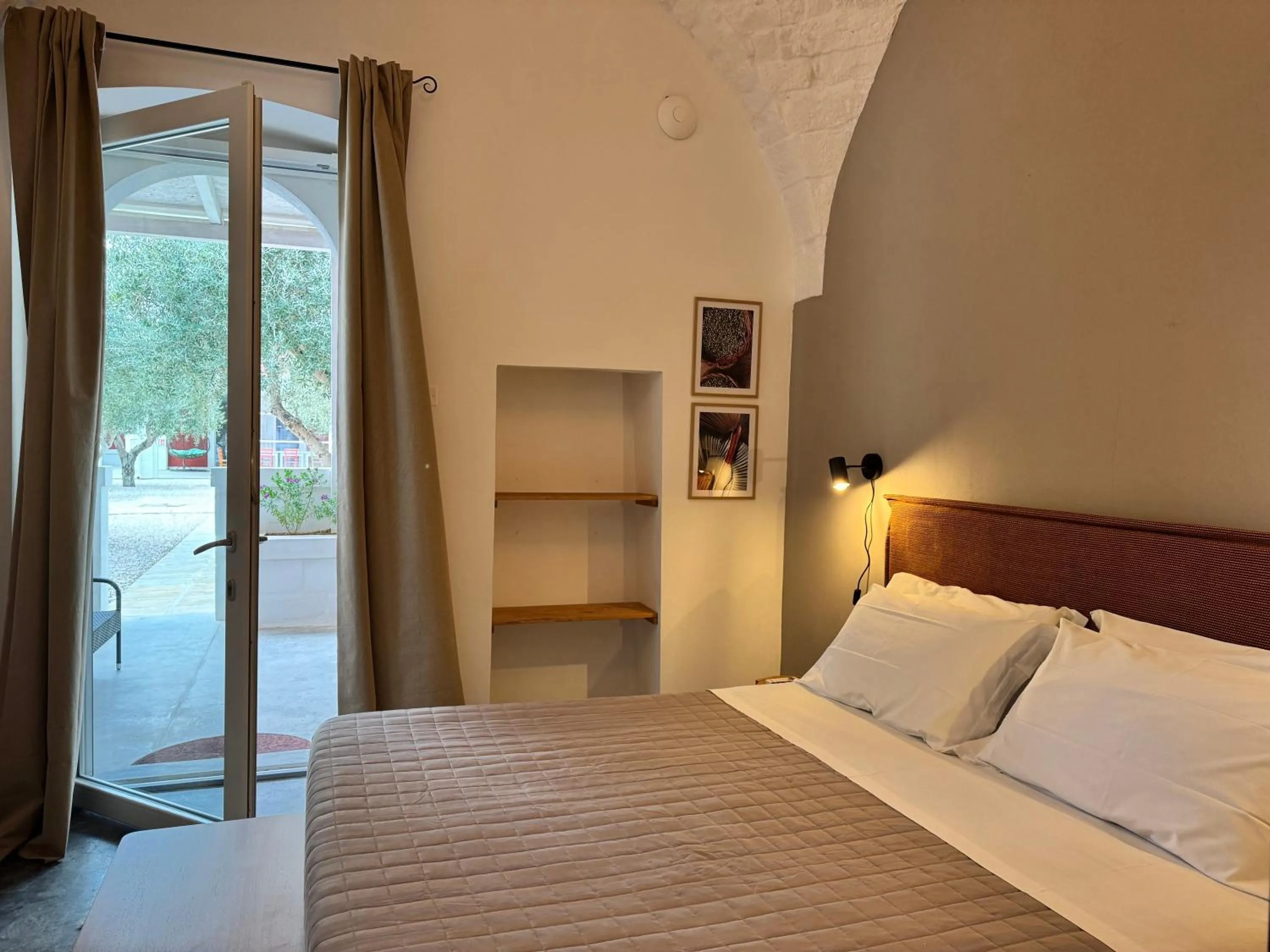 Bed in Tenuta Amostuni-Country House