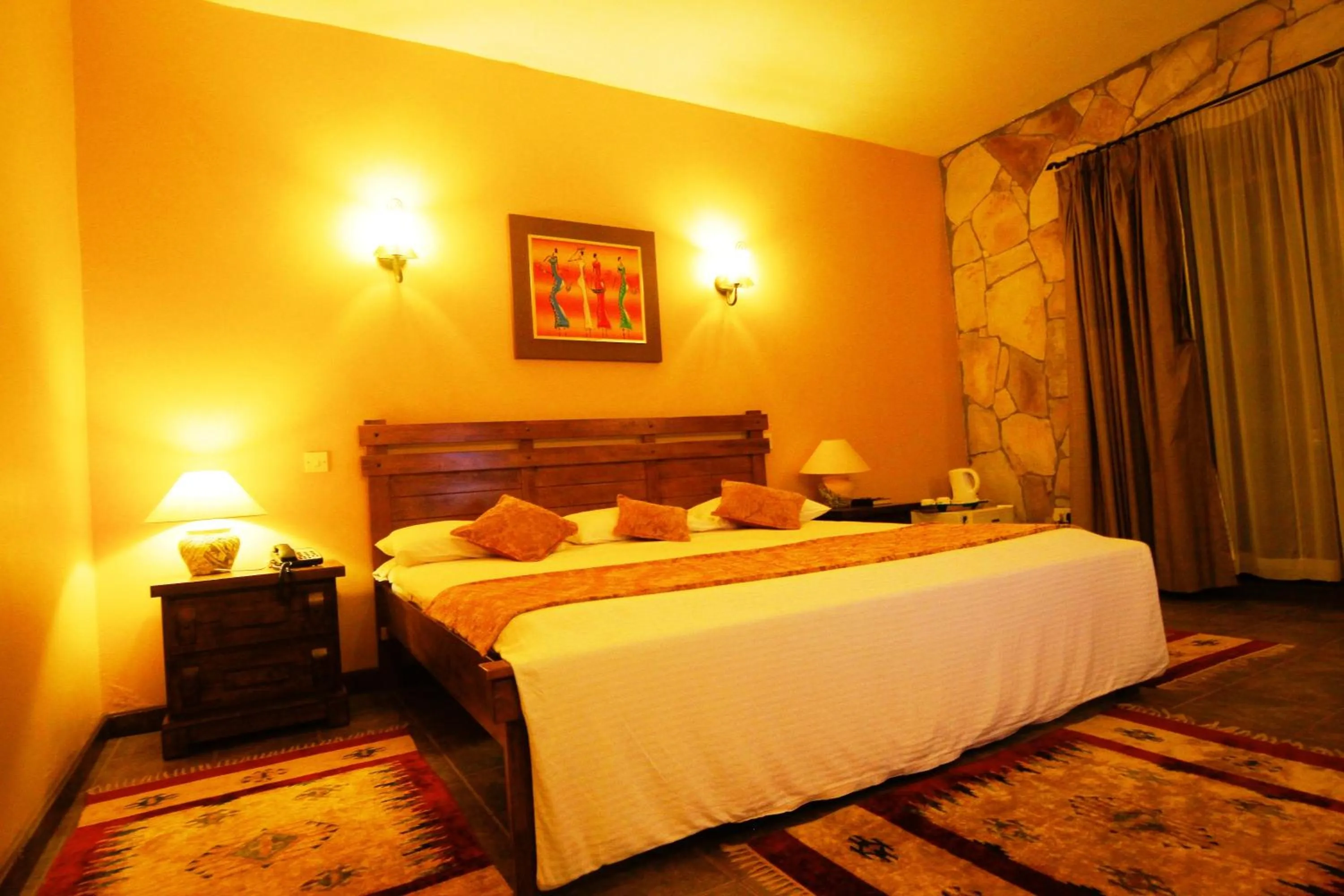 Bed in Mountains of the Moon Hotel Fort Portal