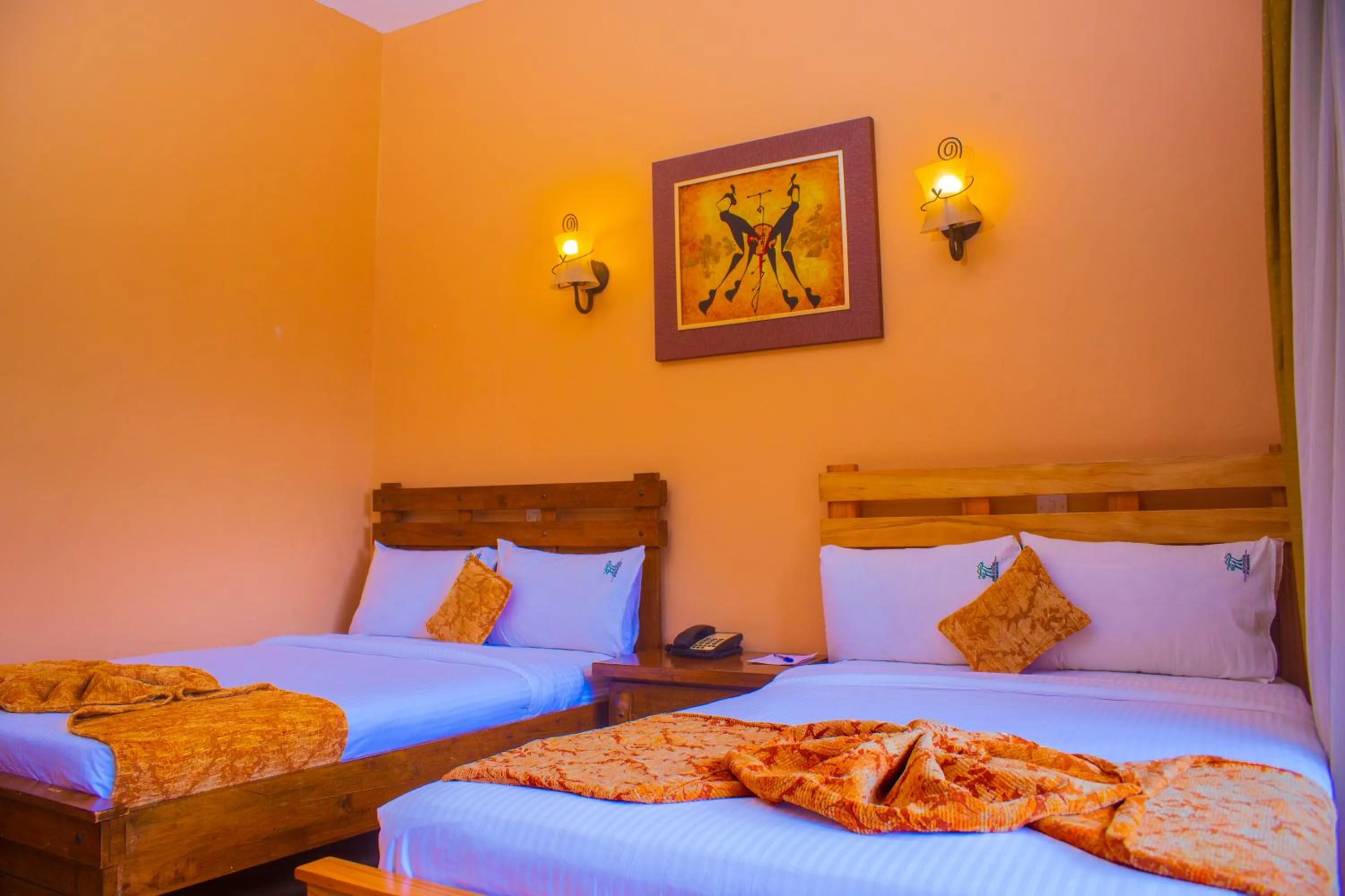 Bed in Mountains of the Moon Hotel Fort Portal