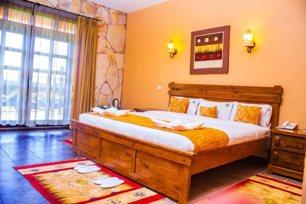 Bed in Mountains of the Moon Hotel Fort Portal