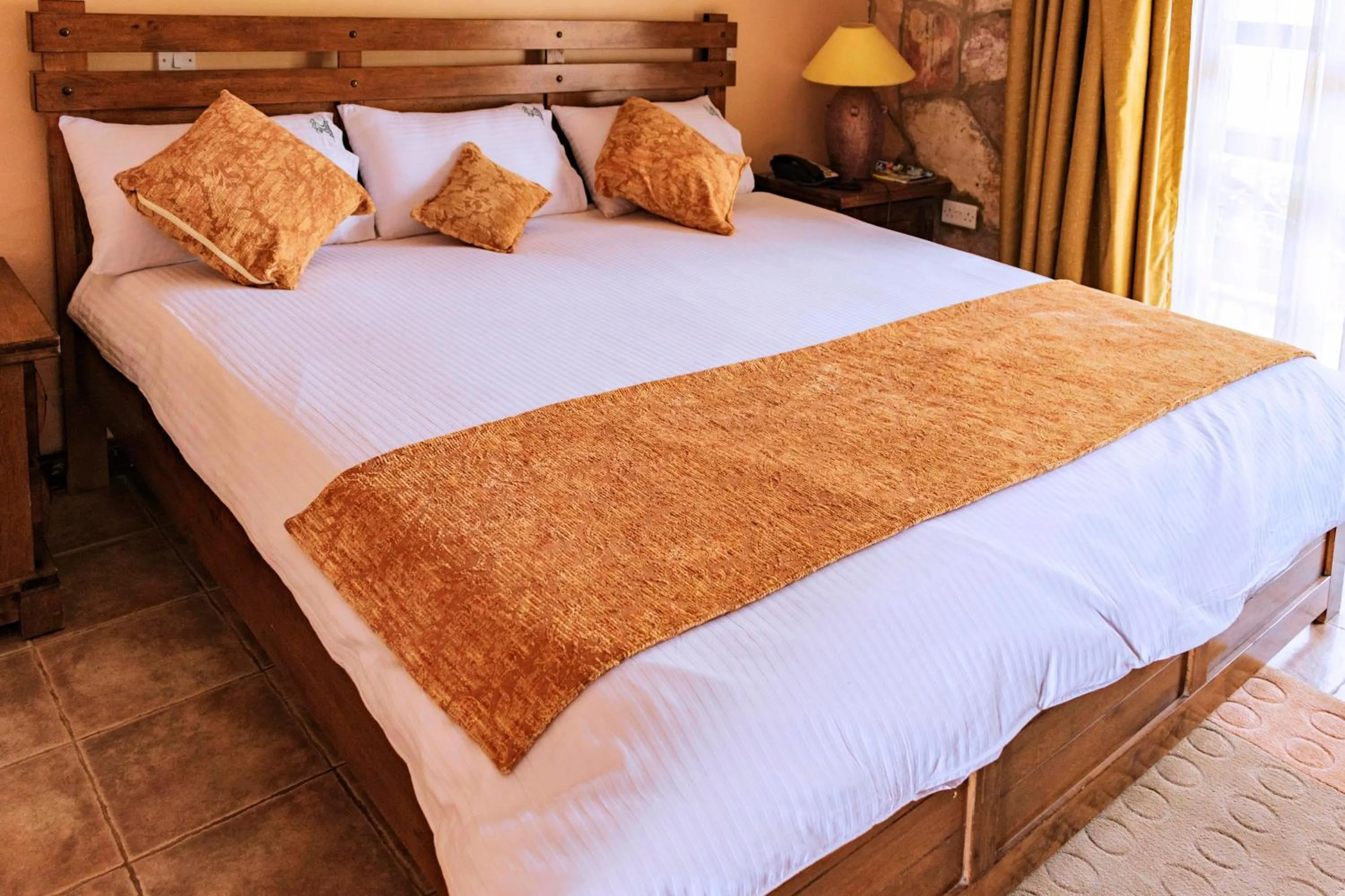 Bed in Mountains of the Moon Hotel Fort Portal