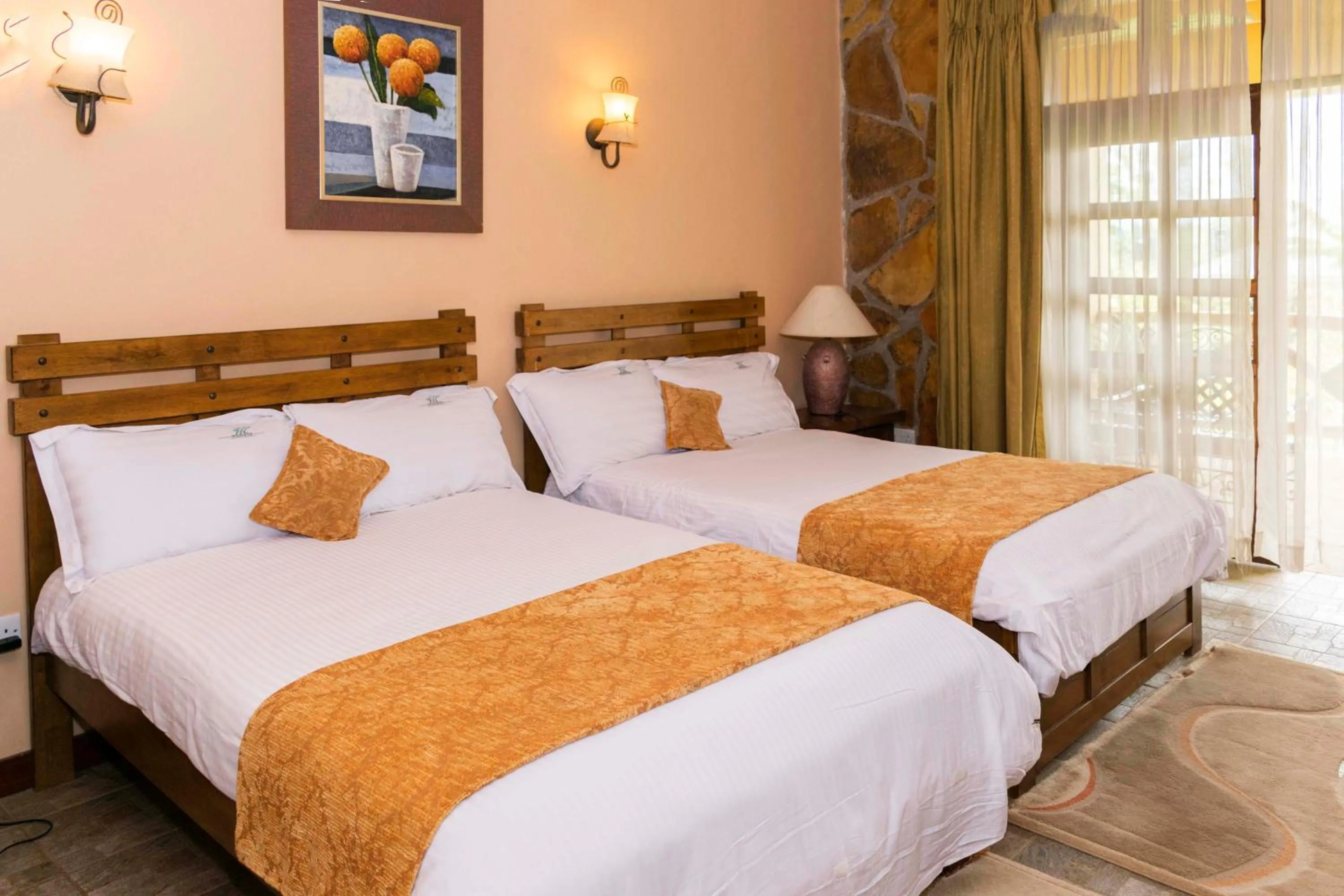 Bed in Mountains of the Moon Hotel Fort Portal