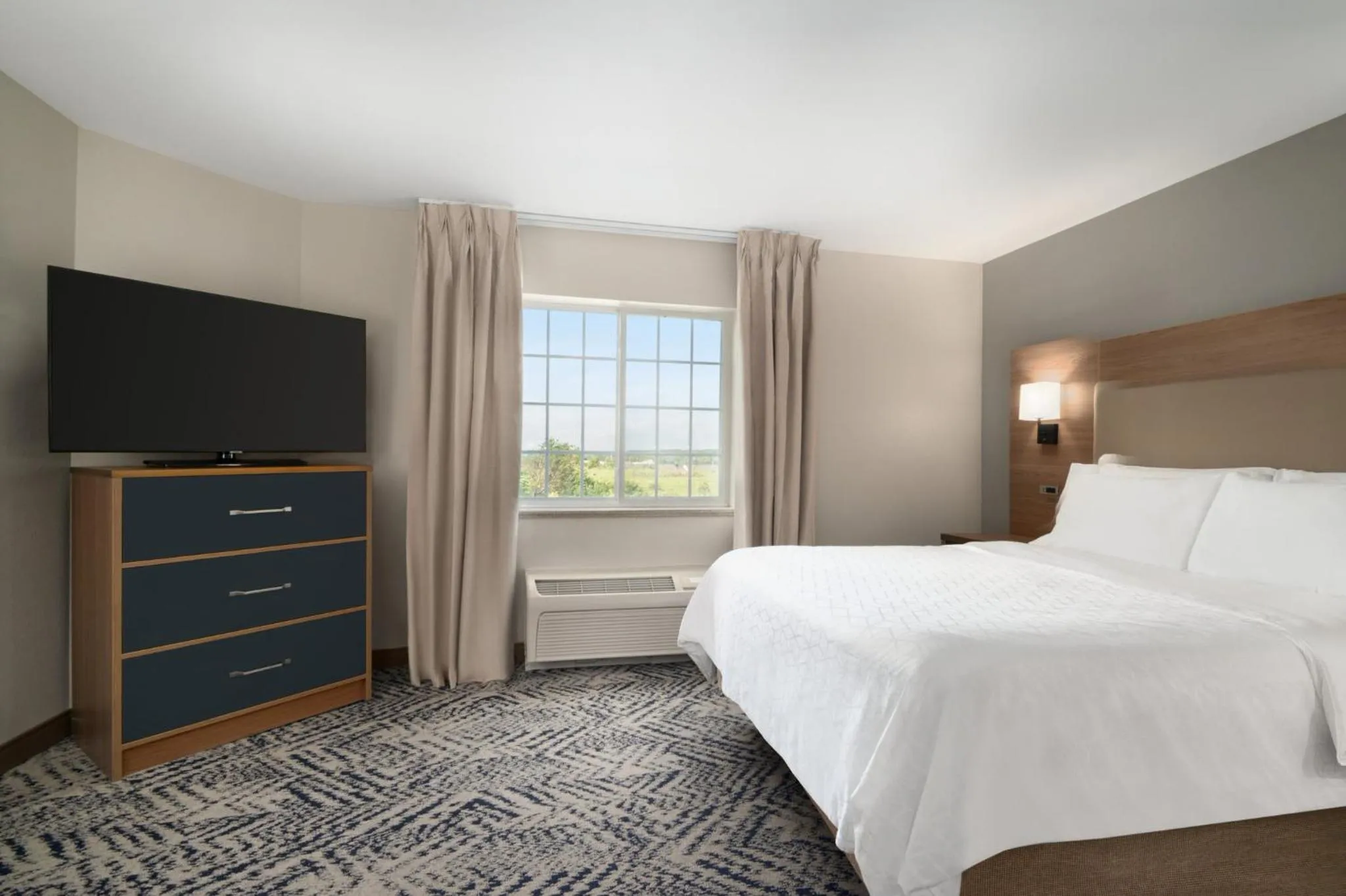 Photo of the whole room, Bed in Candlewood Suites Watertown Fort Drum by IHG
