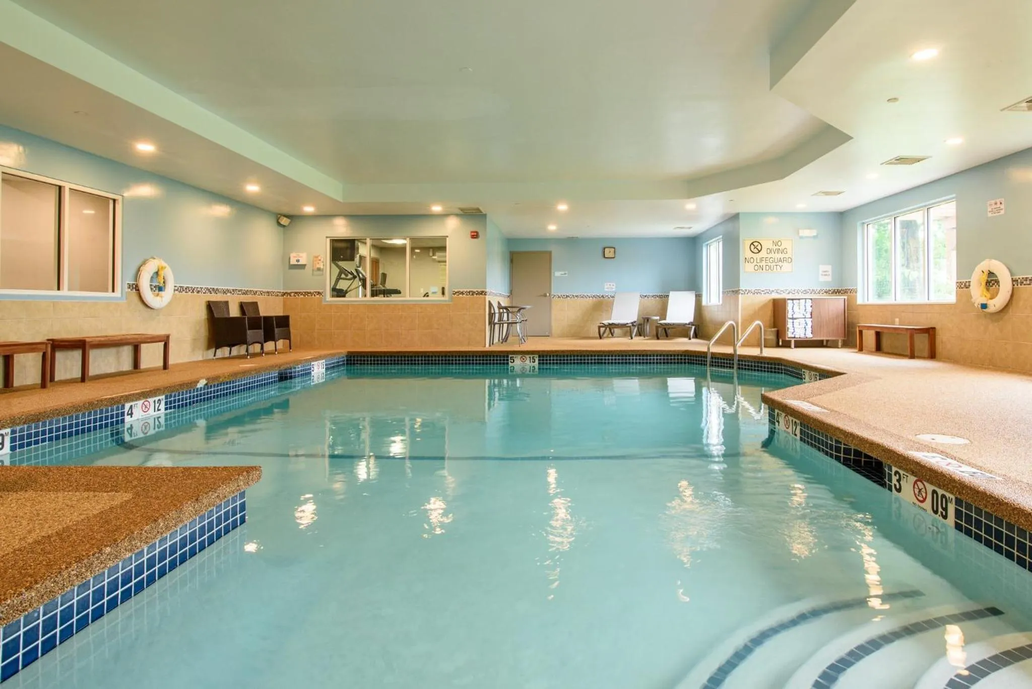 Swimming pool in Holiday Inn Express Hotel & Suites Hampton South-Seabrook by IHG
