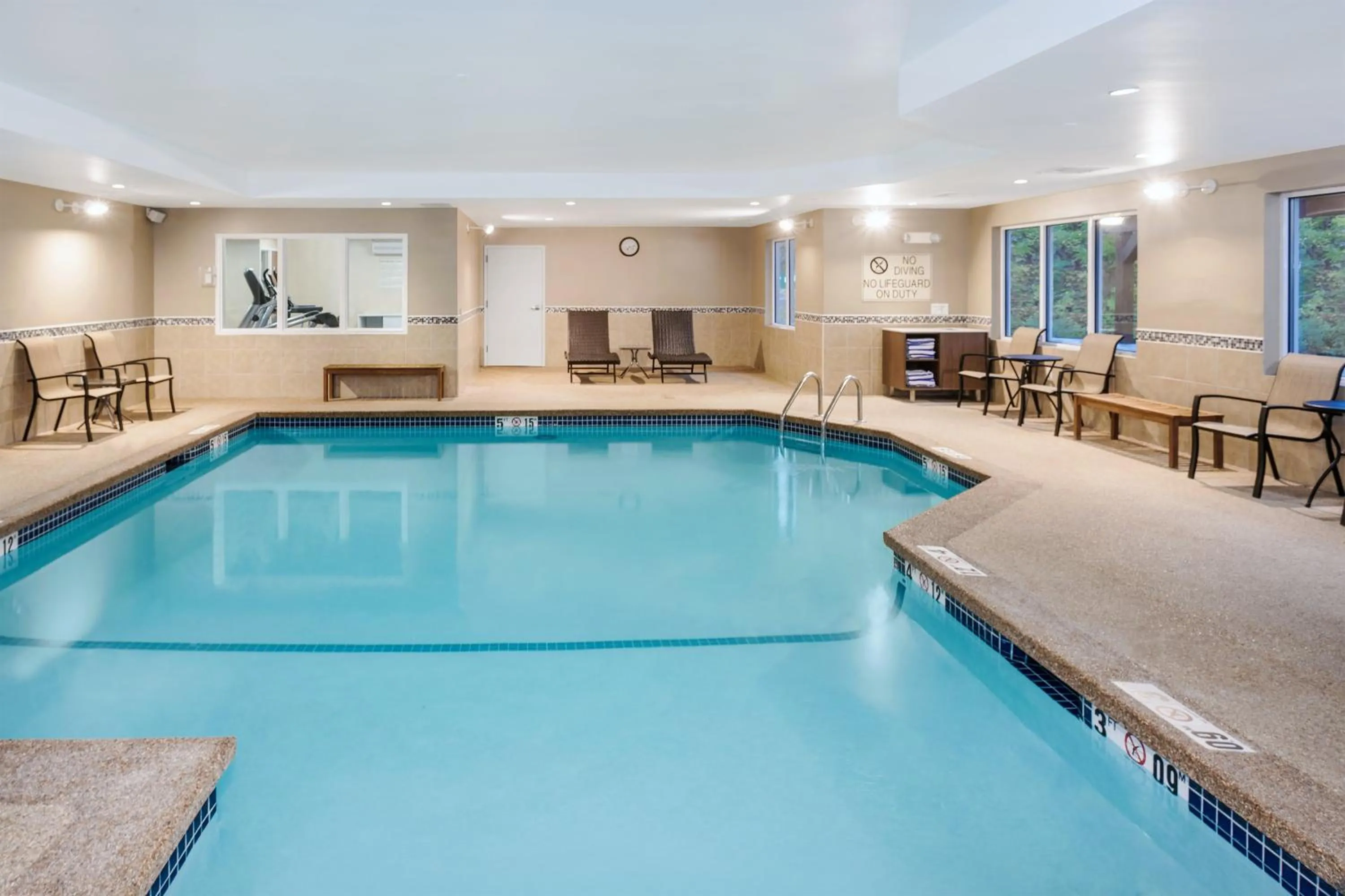 Swimming pool in Holiday Inn Express Hotel & Suites Hampton South-Seabrook by IHG