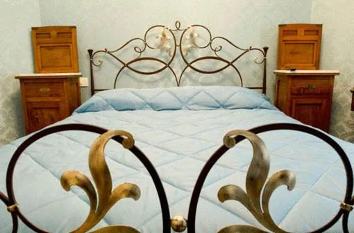 Bed in Grana Barocco Art Hotel