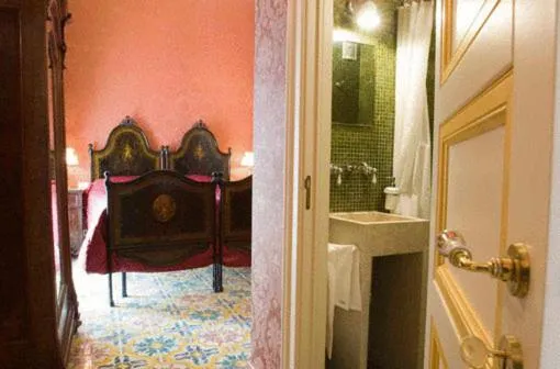 Photo of the whole room in Grana Barocco Art Hotel