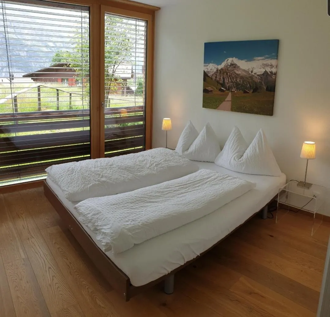 Bed in Hotel Jungfrau Mürren