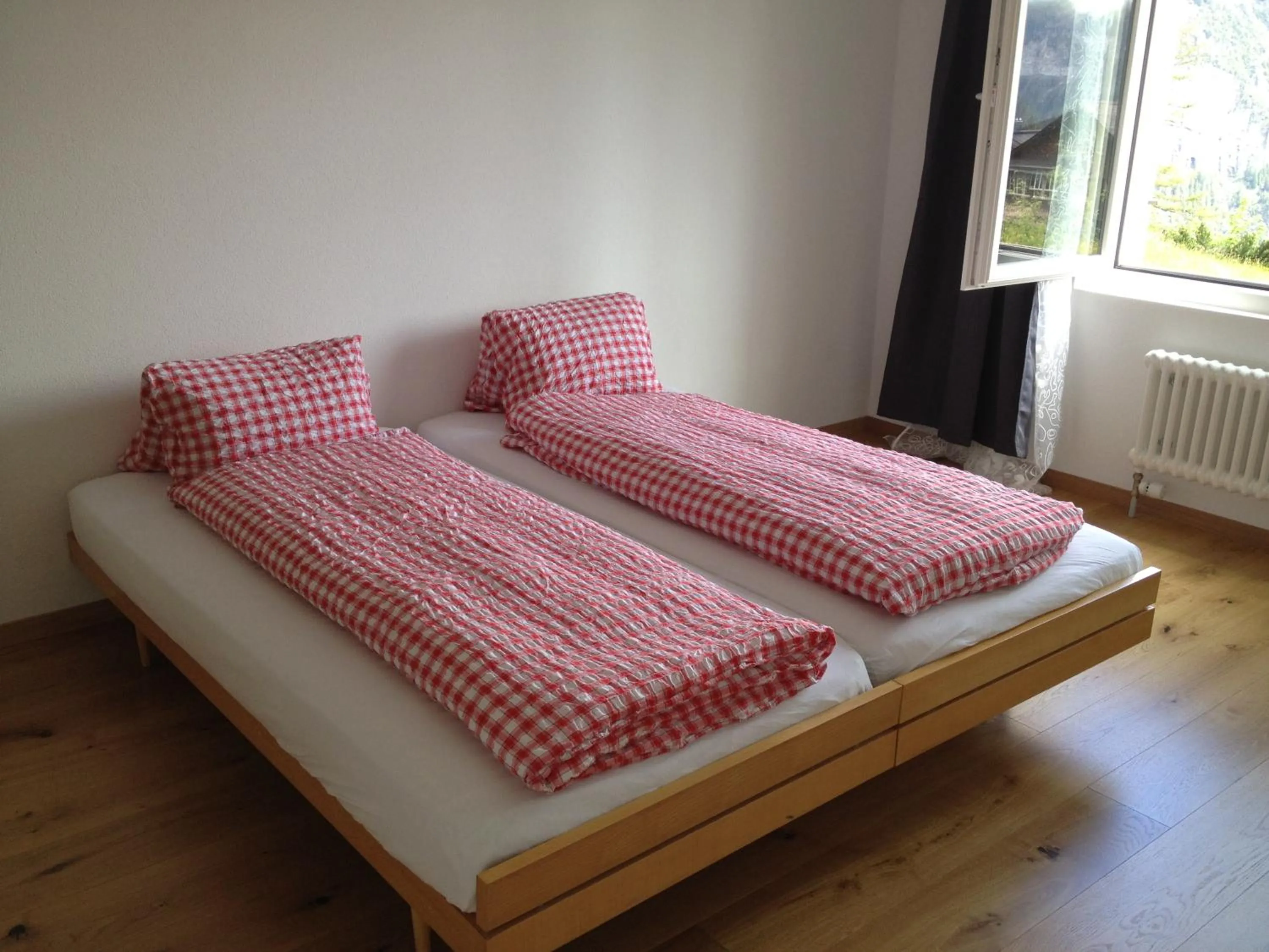 Bed in Hotel Jungfrau Mürren