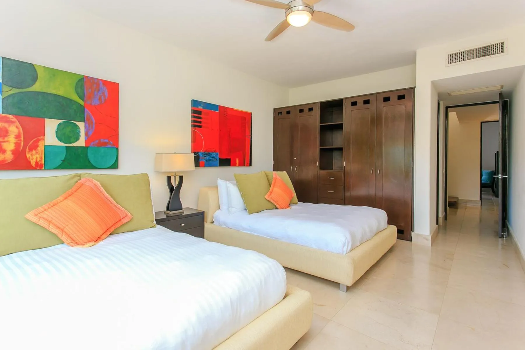 Bedroom in 3-Level Condo with a Private Balcony & Rooftop Lounge