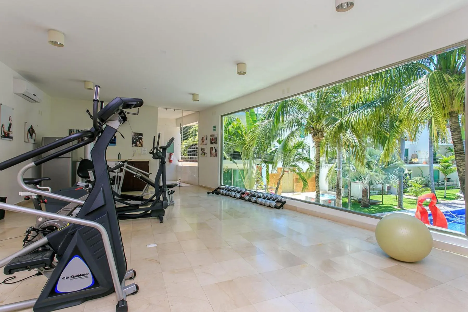 Fitness centre/facilities in 3-Level Condo with a Private Balcony & Rooftop Lounge