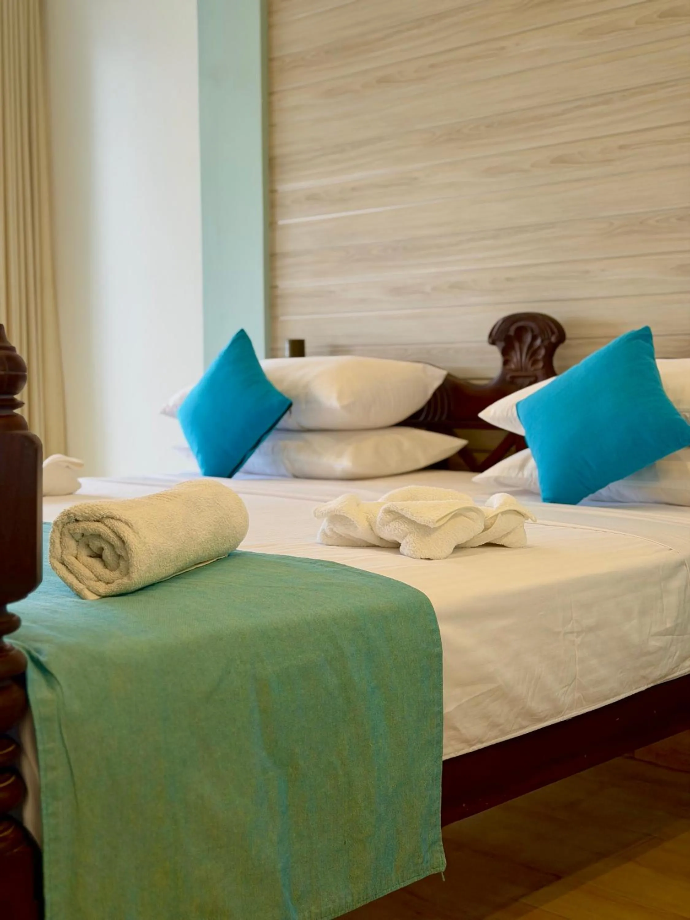 Bed in Sri Gemunu Beach Resort