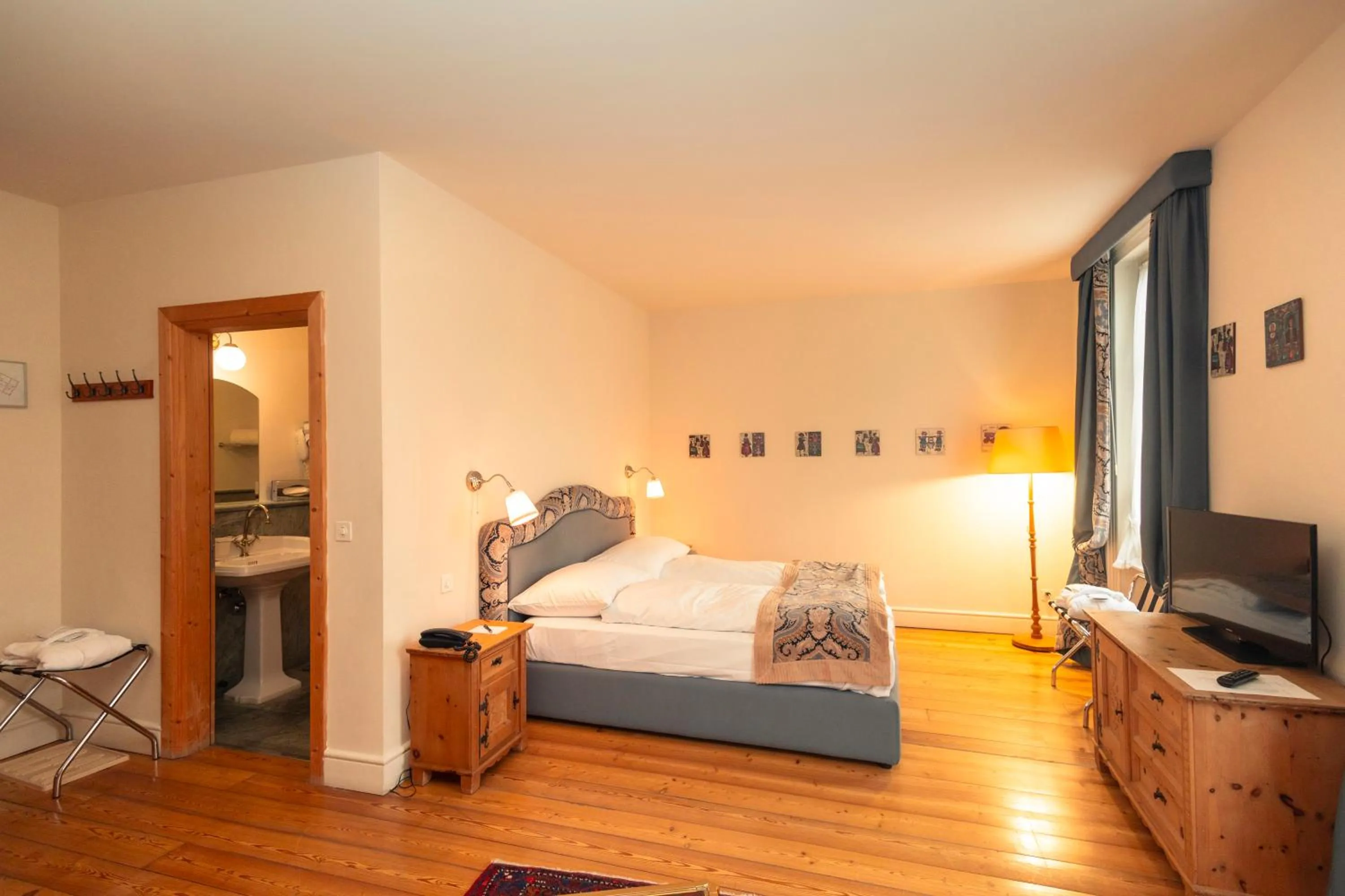 Bed in Hotel Bernina 1865 by Kleos Group Collection