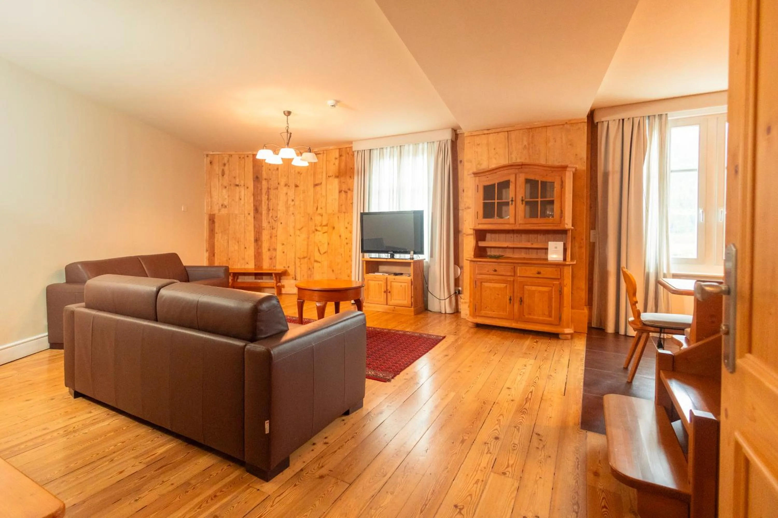 Communal lounge/ TV room in Hotel Bernina 1865 by Kleos Group Collection