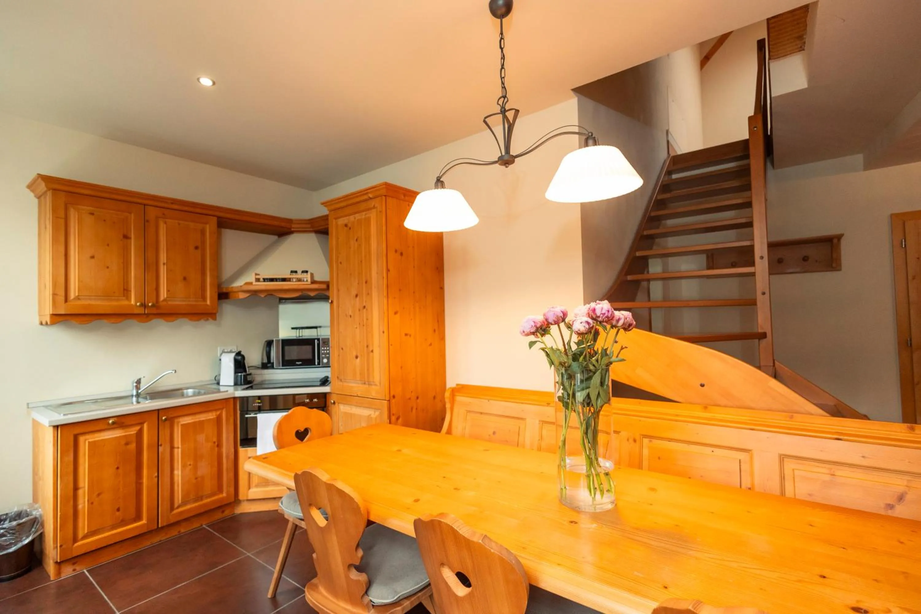 Kitchen or kitchenette in Hotel Bernina 1865 by Kleos Group Collection