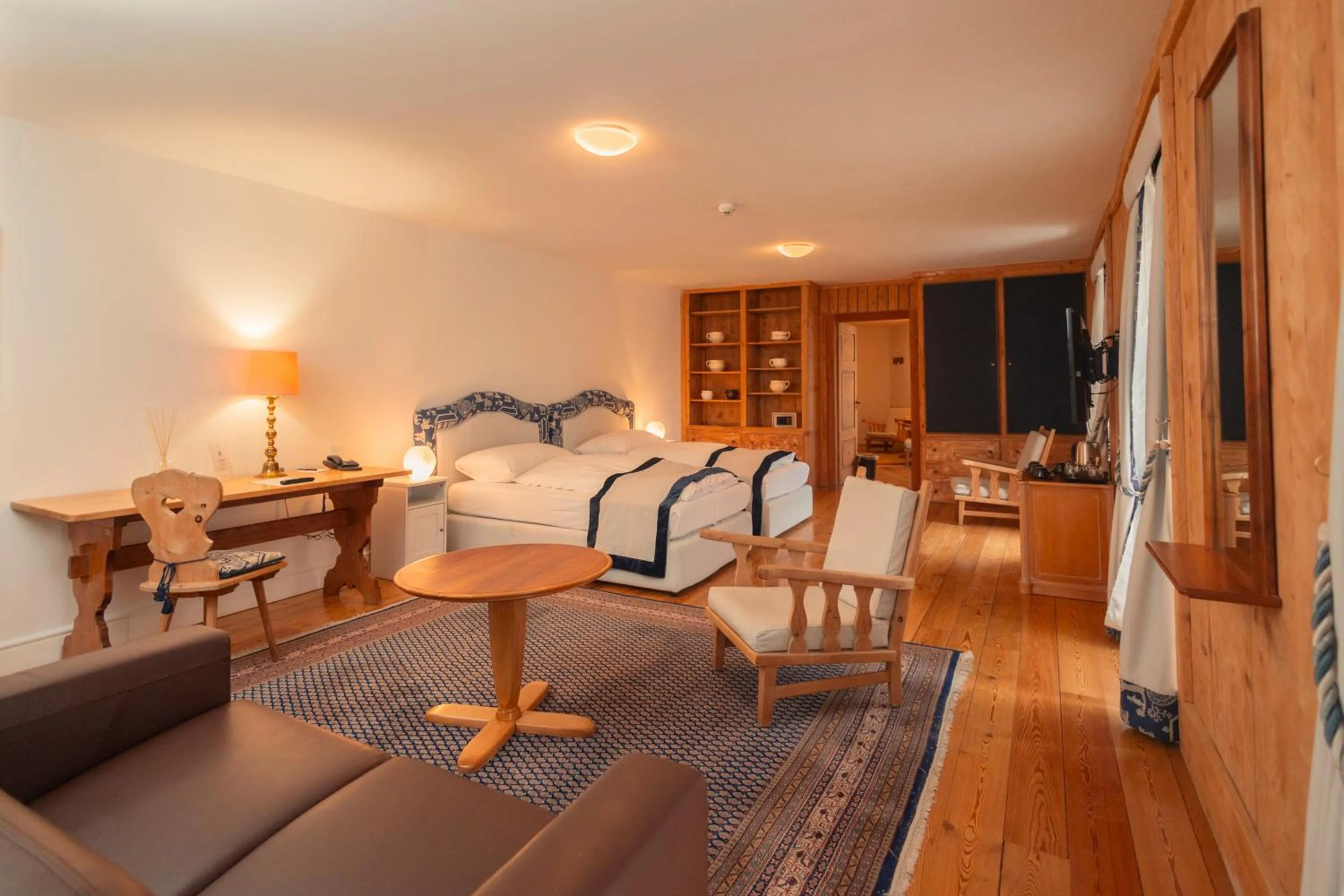 Living room in Hotel Bernina 1865 by Kleos Group Collection