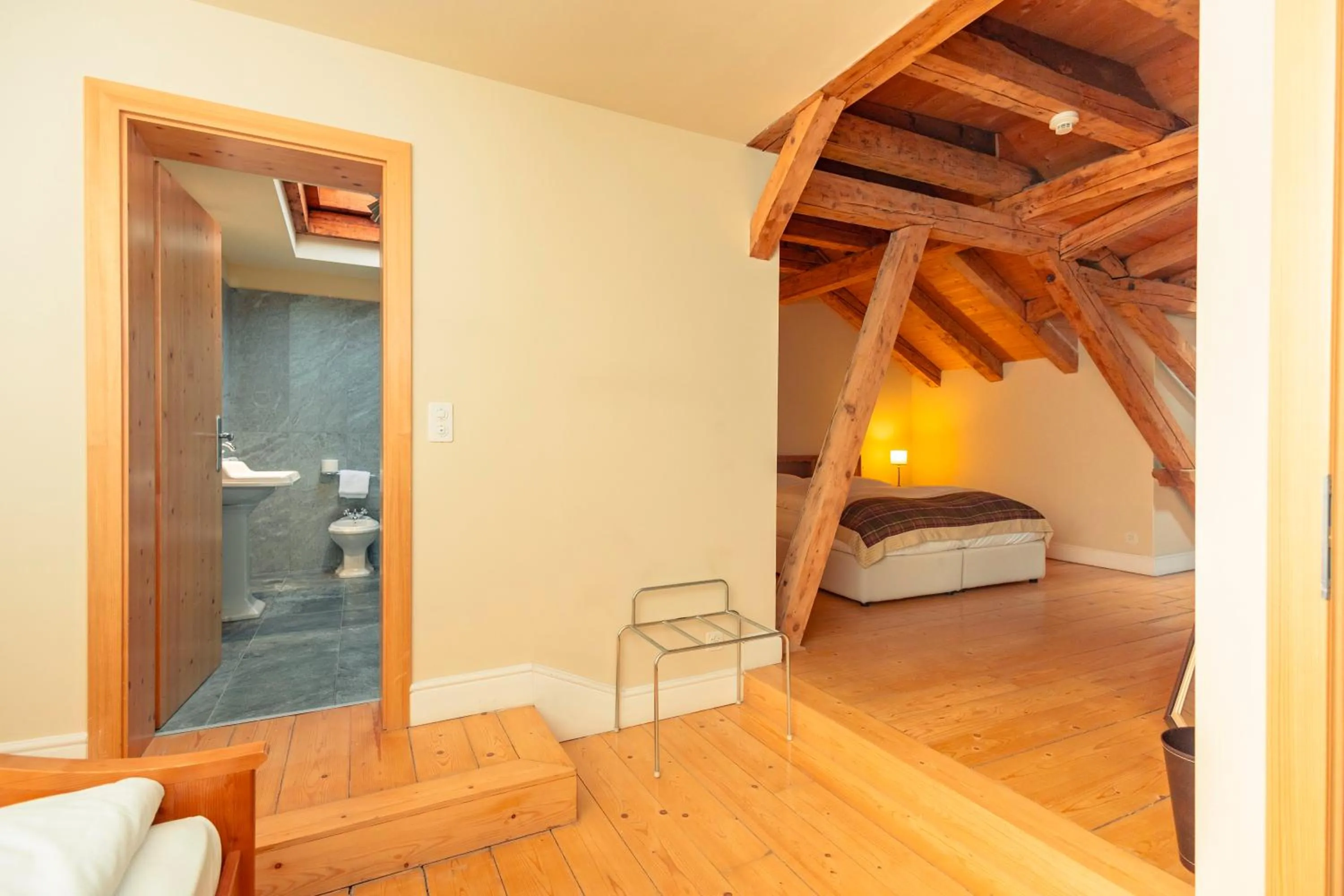 Bed in Hotel Bernina 1865 by Kleos Group Collection