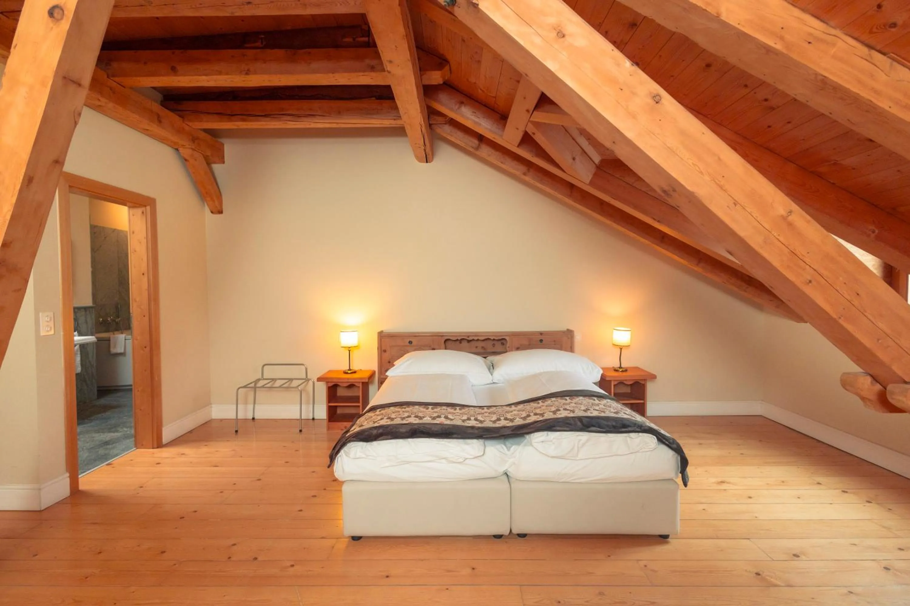 Bed in Hotel Bernina 1865 by Kleos Group Collection