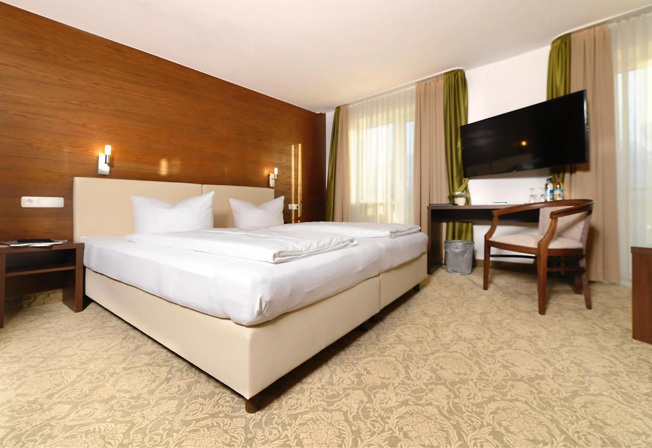 Bed in Hotel Bayerisch Meran