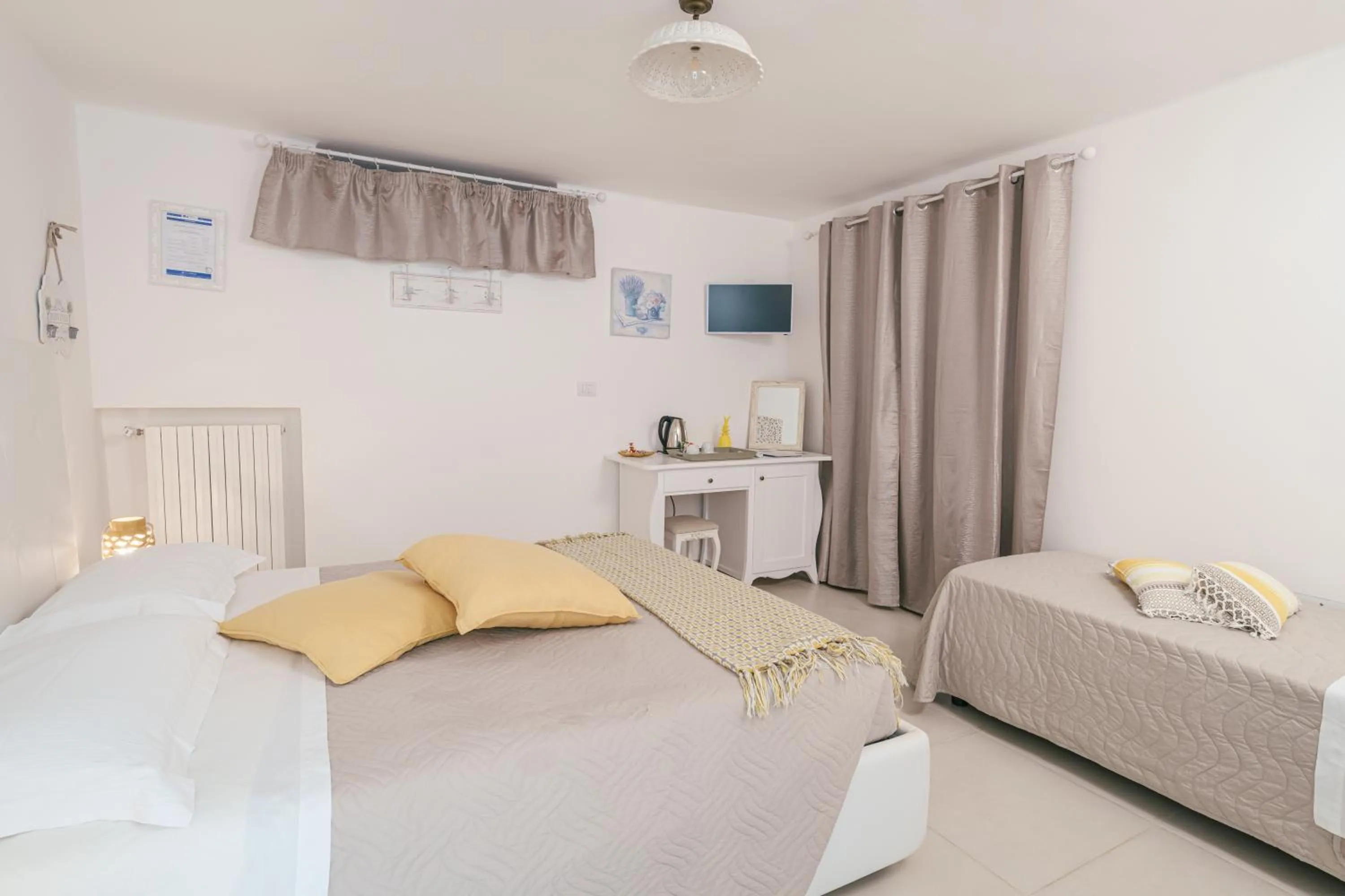 Bed in La Terrazza Sulla Rupe Relais