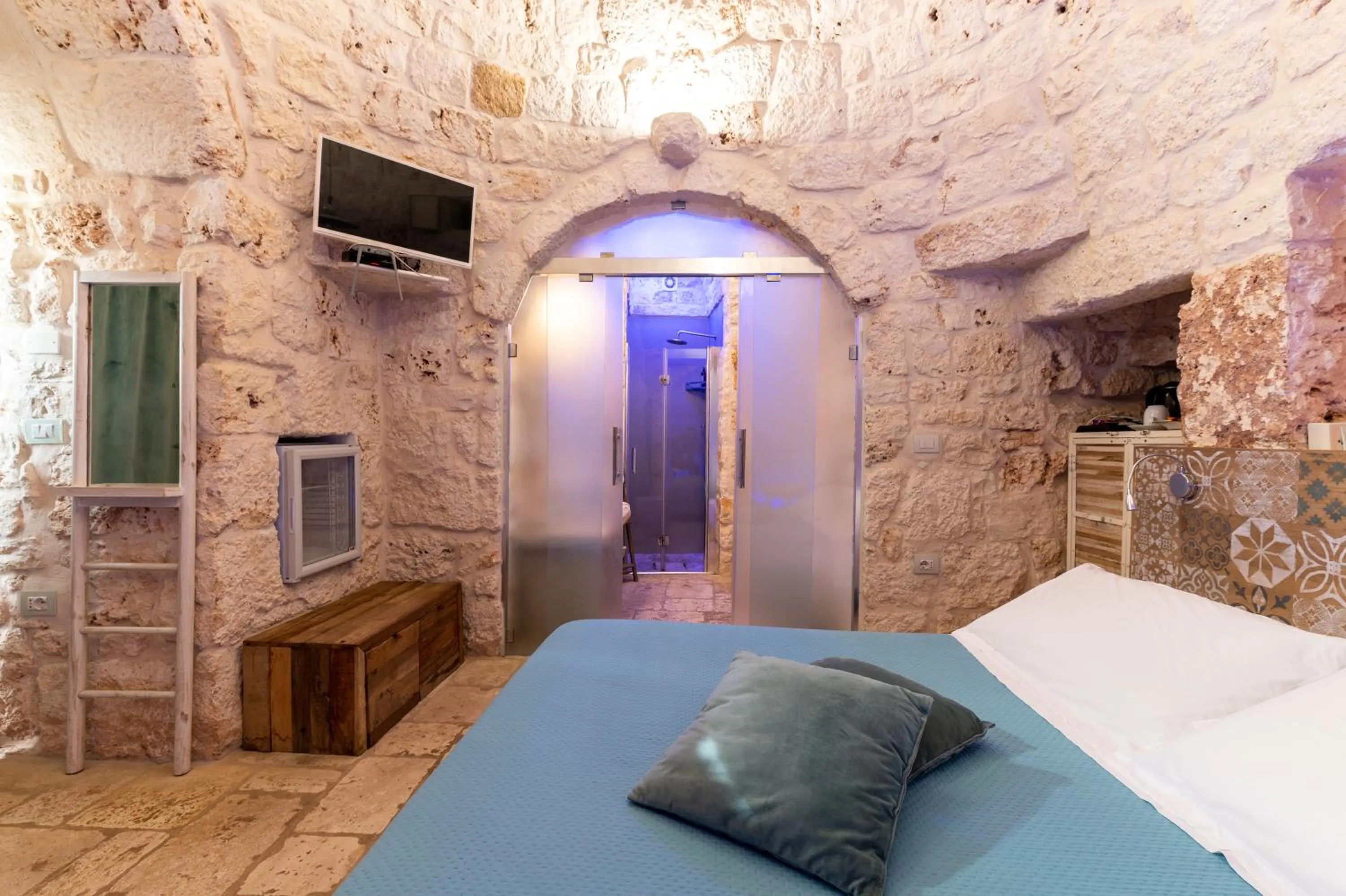 Bed in La Terrazza Sulla Rupe Relais