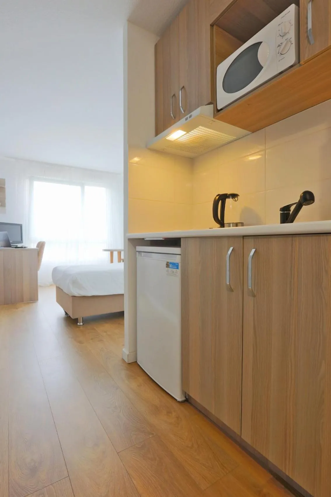 Bed in KOSY Appart'Hôtels - La Maison Des Chercheurs