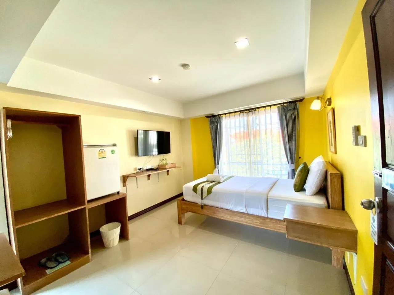 Photo of the whole room, Bed in Chinda Boutique Hotel