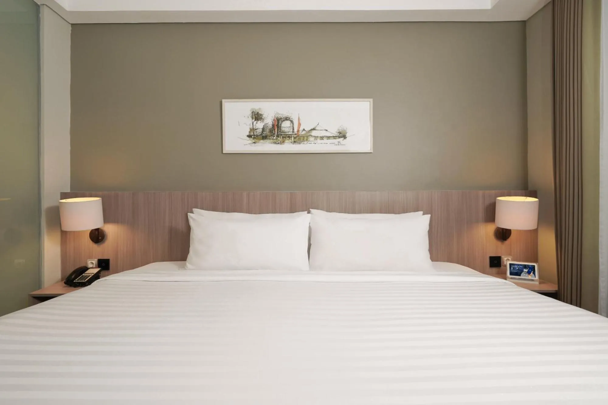 Bed in Aston Inn Mataram