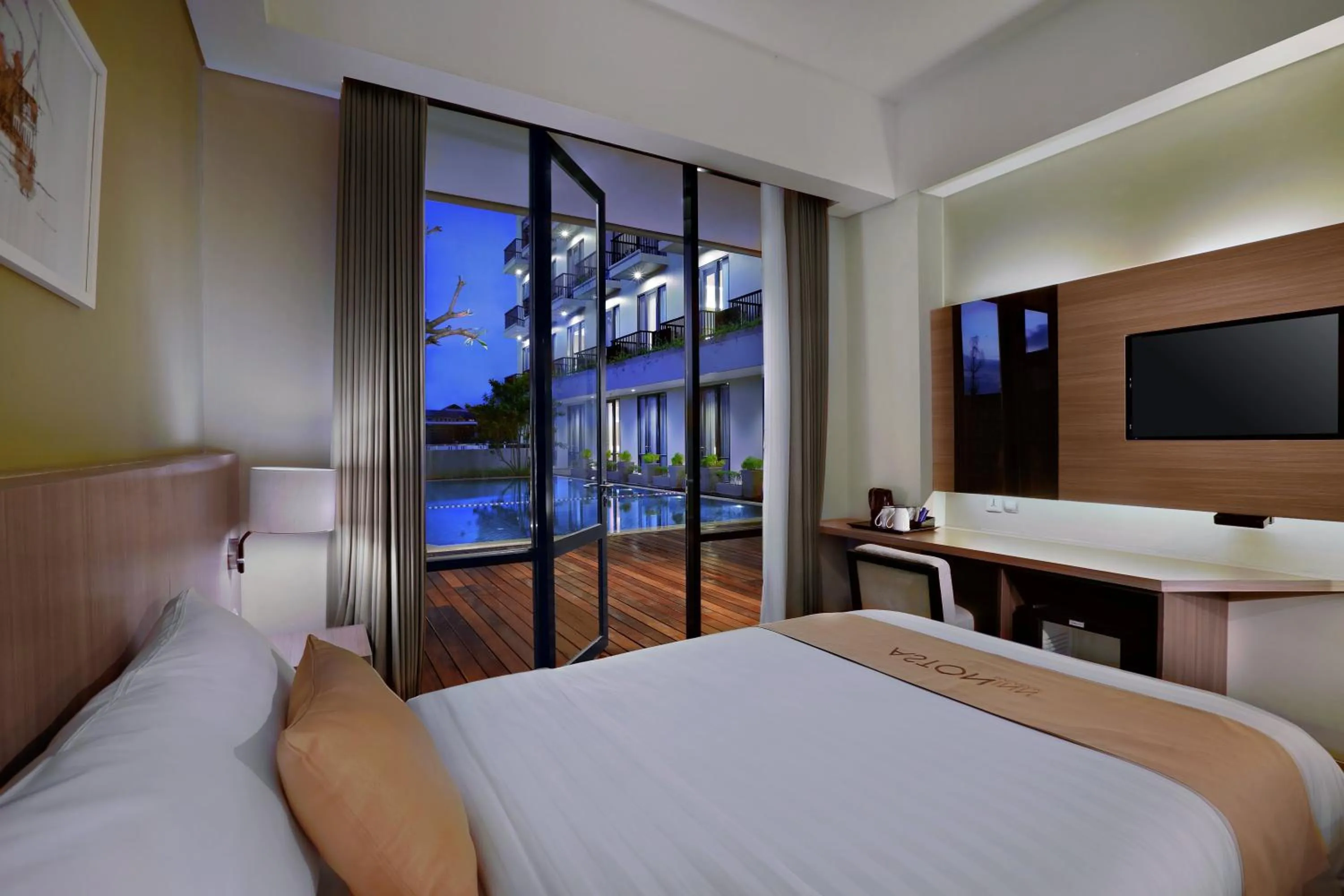 Bedroom, Bed in Aston Inn Mataram