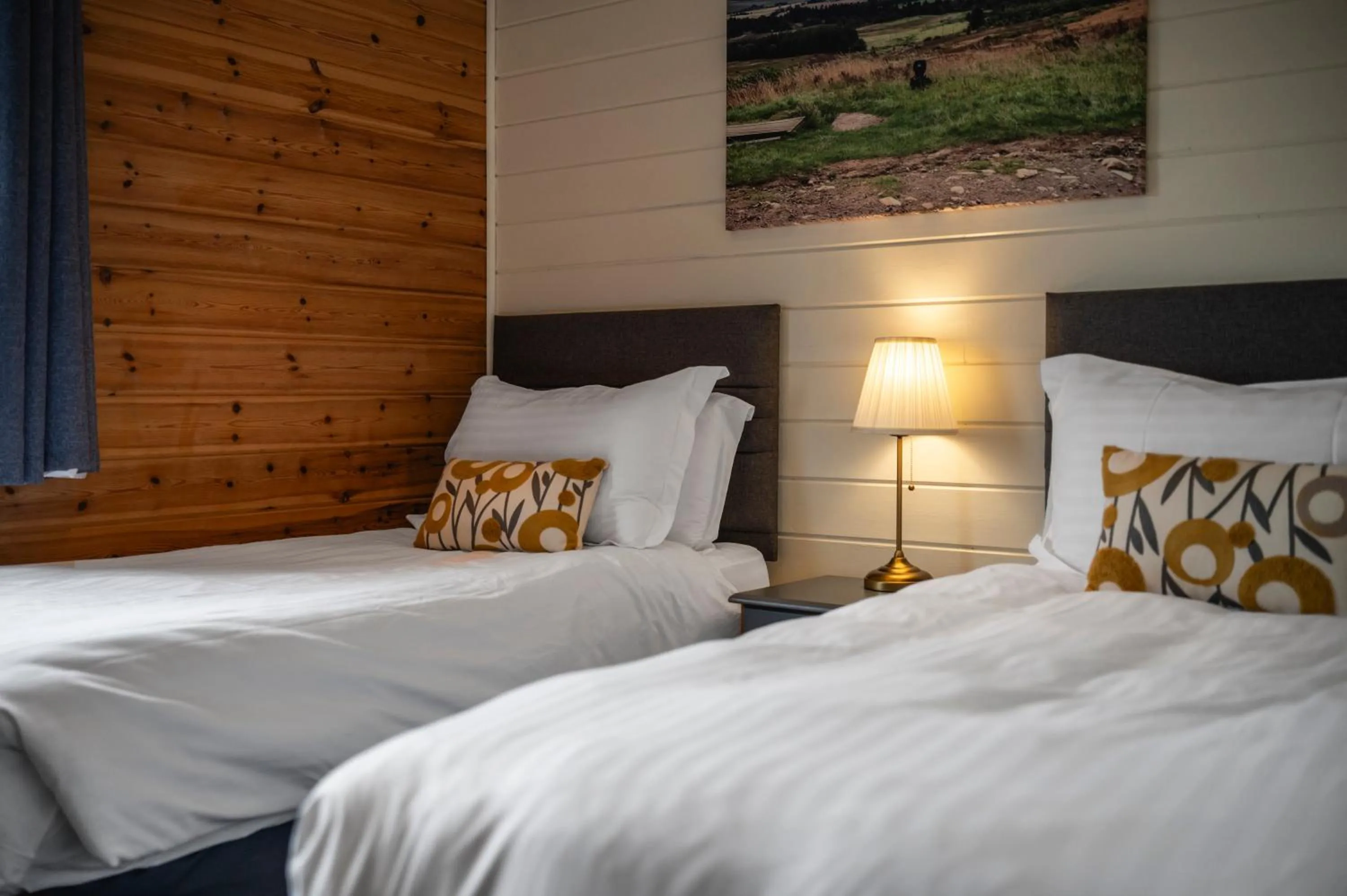 Bed in Kinnaird Woodland Lodges