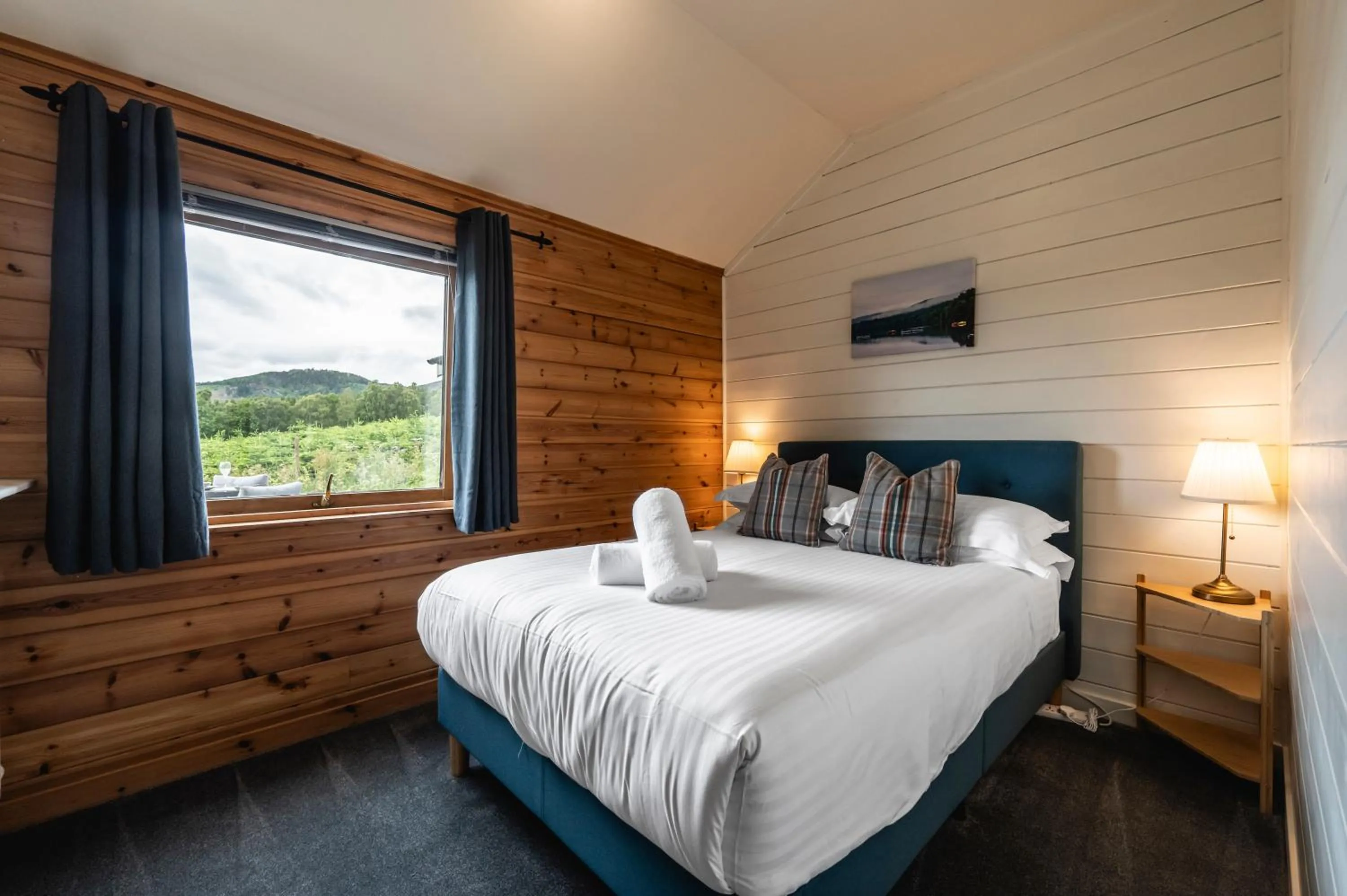 Bed in Kinnaird Woodland Lodges