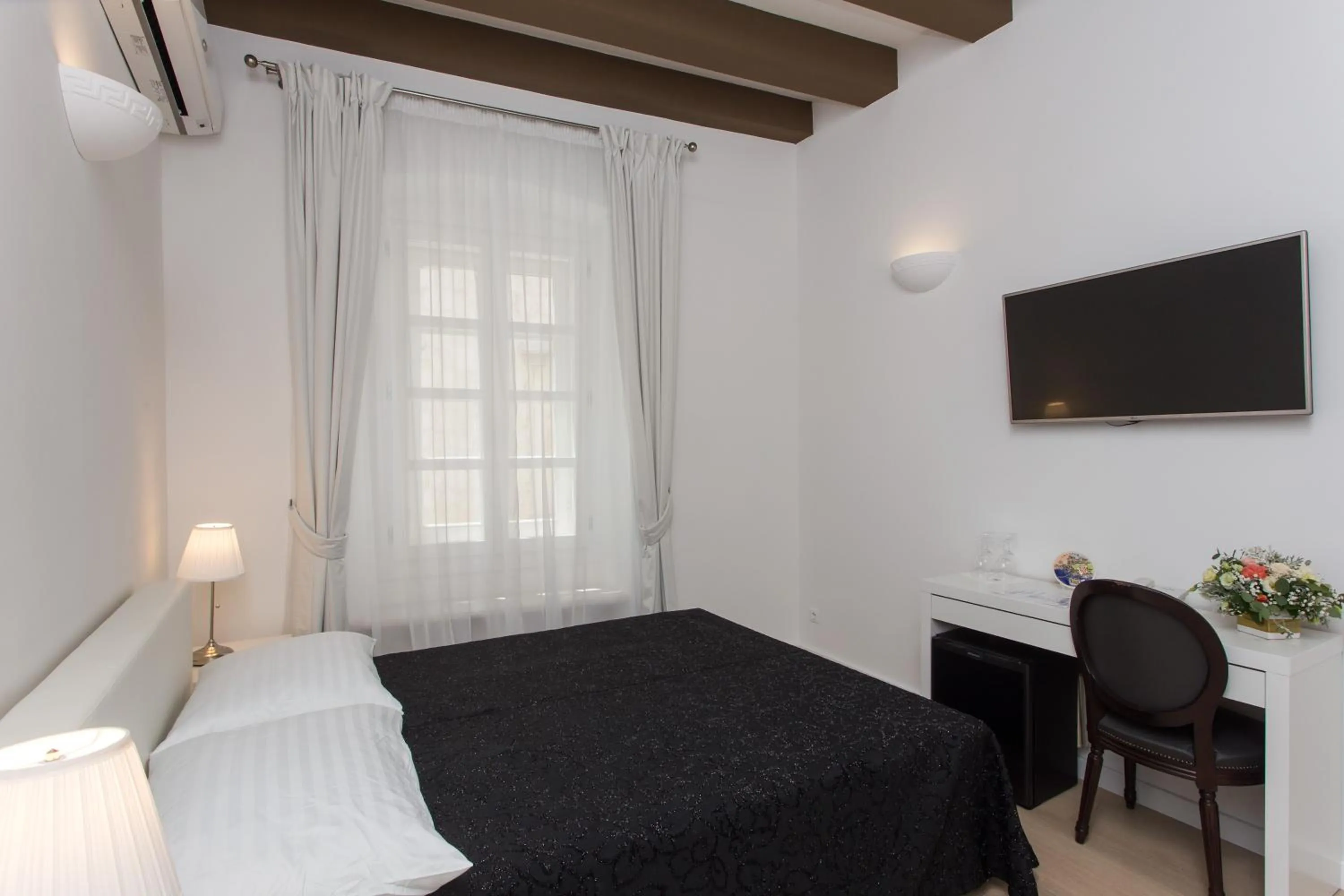 Bedroom in Klarisa Palace Rooms