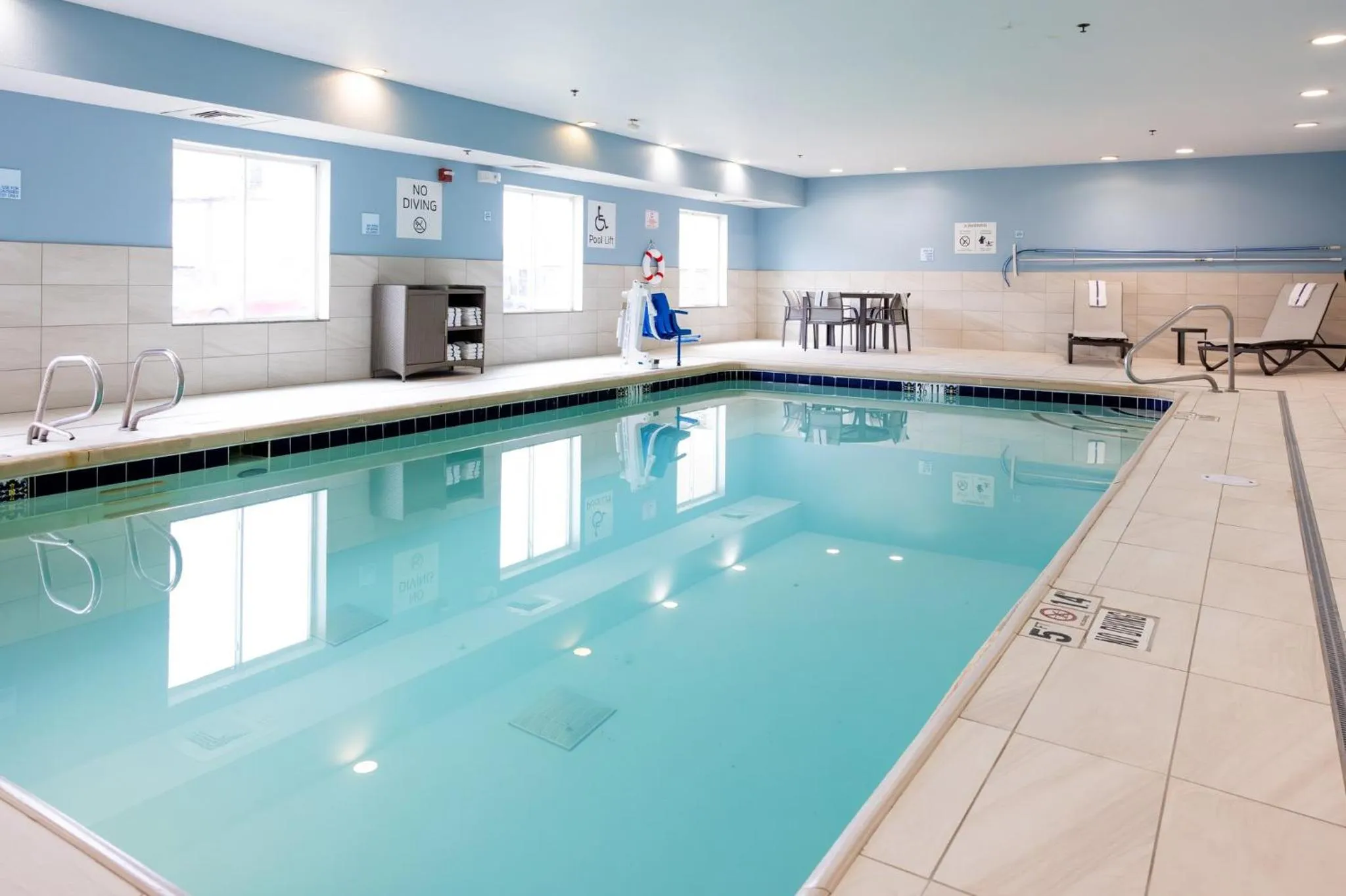 Swimming pool in Holiday Inn Express Hotel & Suites Wichita Airport by IHG