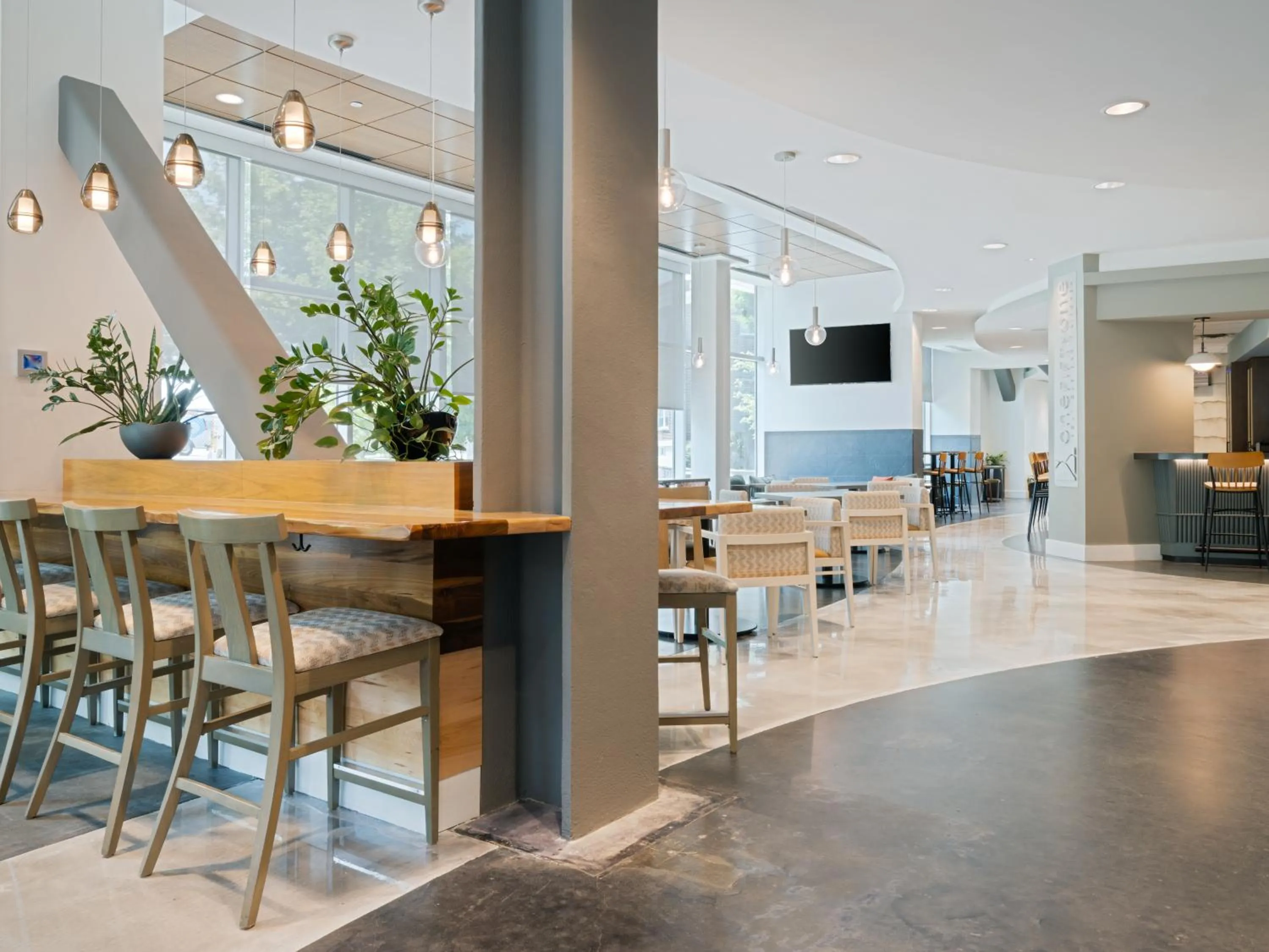 Communal lounge/ TV room in Hotel Indigo Asheville Downtown by IHG