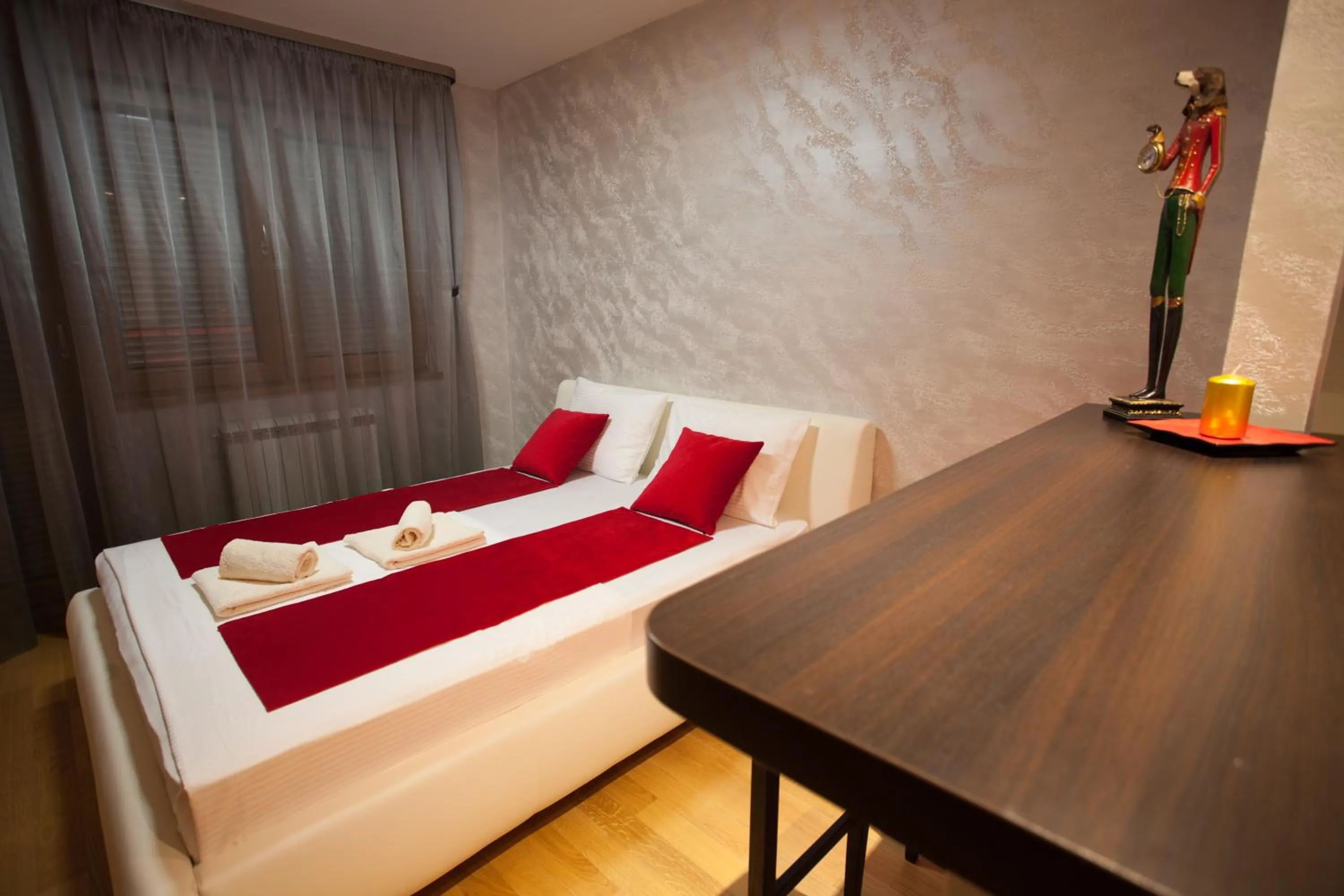 Bedroom, Bed in Gentleman Dog Apartment