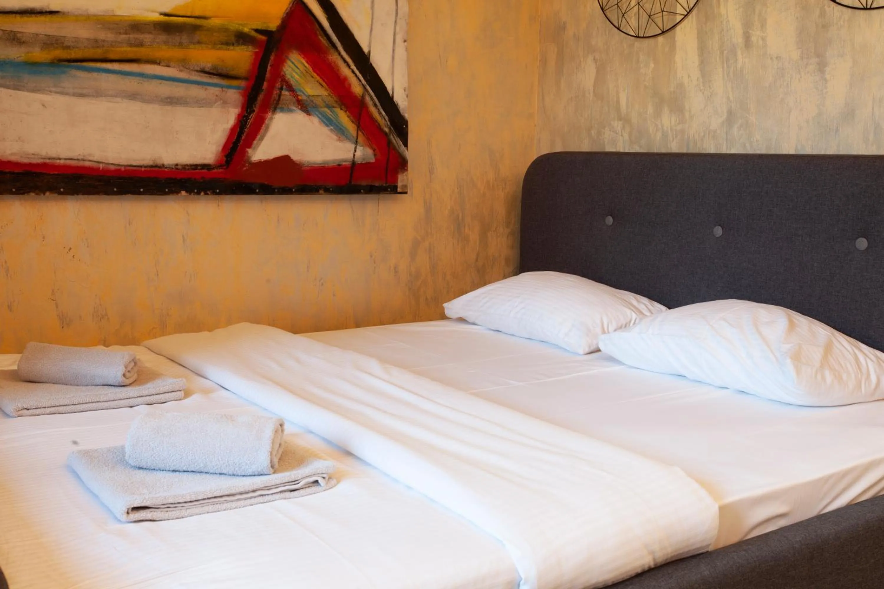 Bed in Gentleman Dog Apartment