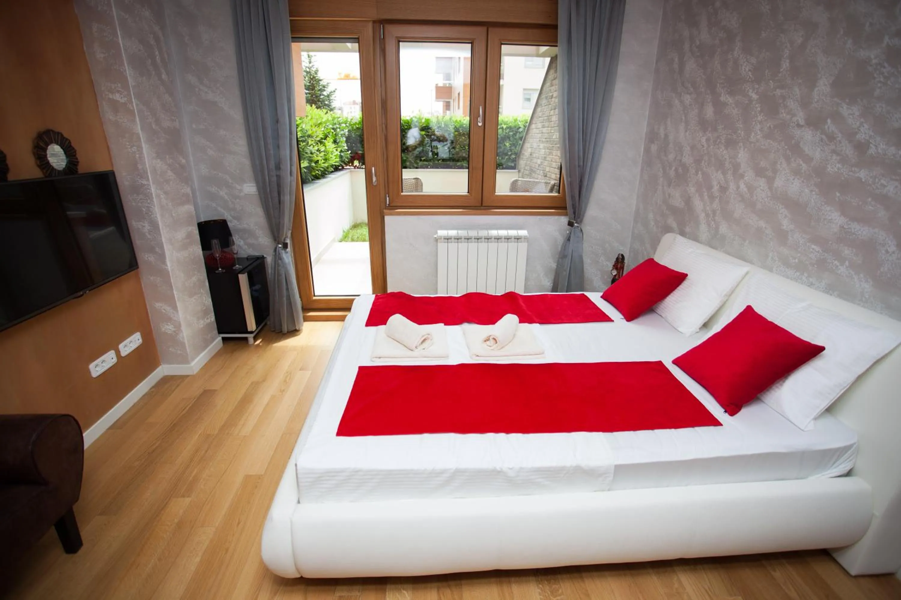 Bedroom, Bed in Gentleman Dog Apartment