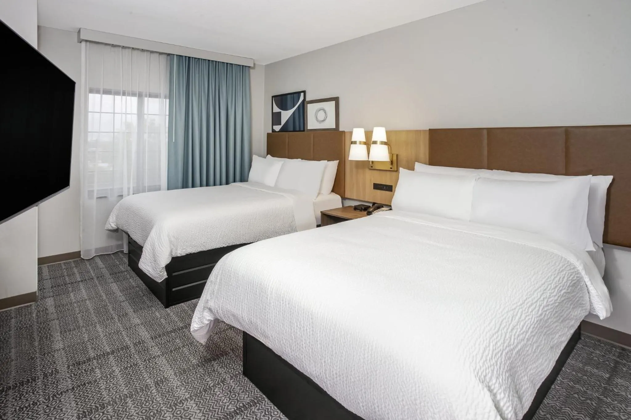 Photo of the whole room, Bed in Staybridge Suites Williamsville Buffalo by IHG