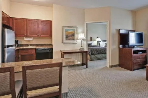 Kitchen or kitchenette, Bed in Staybridge Suites Williamsville Buffalo by IHG