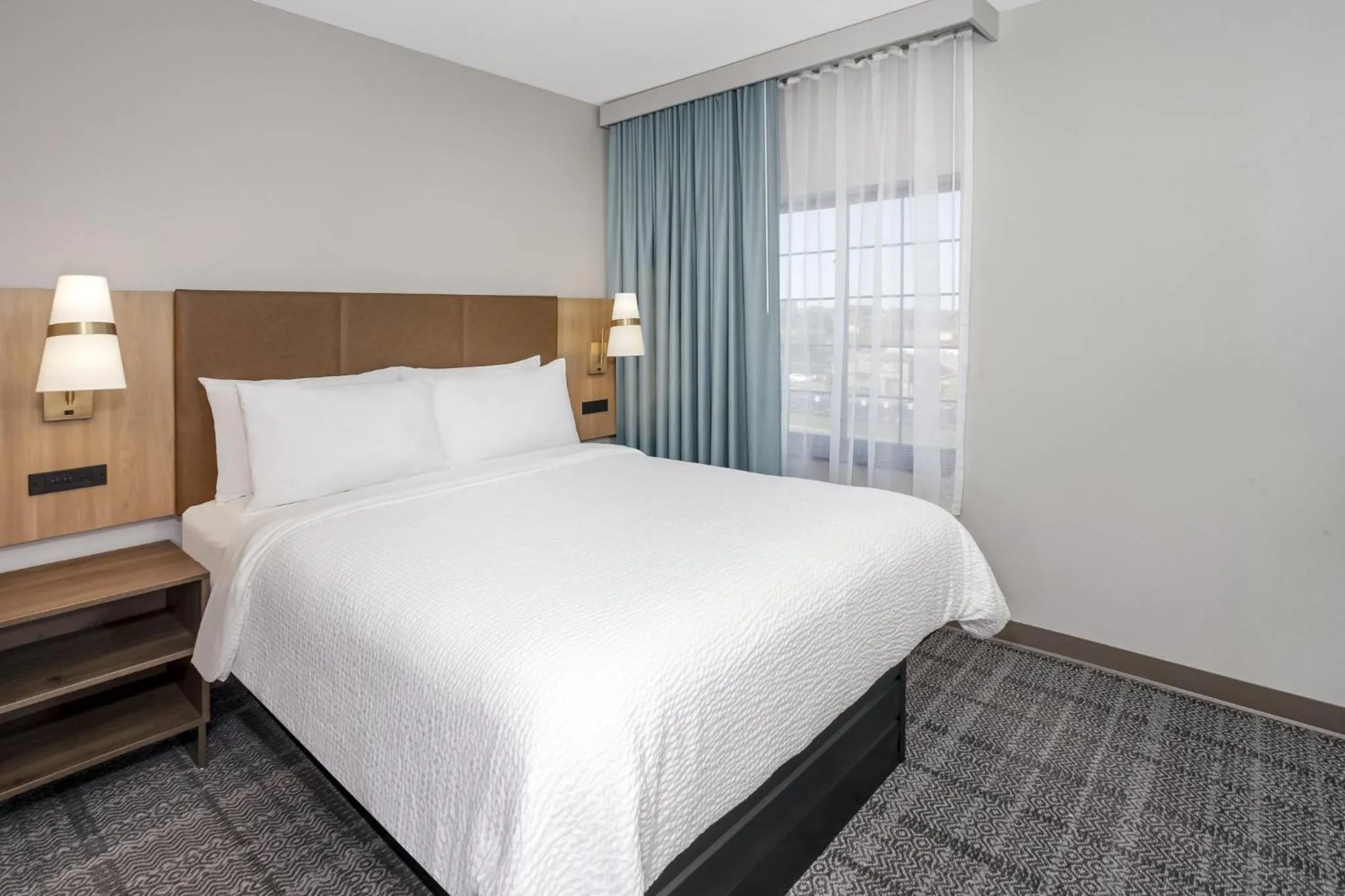 Photo of the whole room, Bed in Staybridge Suites Williamsville Buffalo by IHG