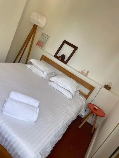 Bed in Hôtel de la Pinède