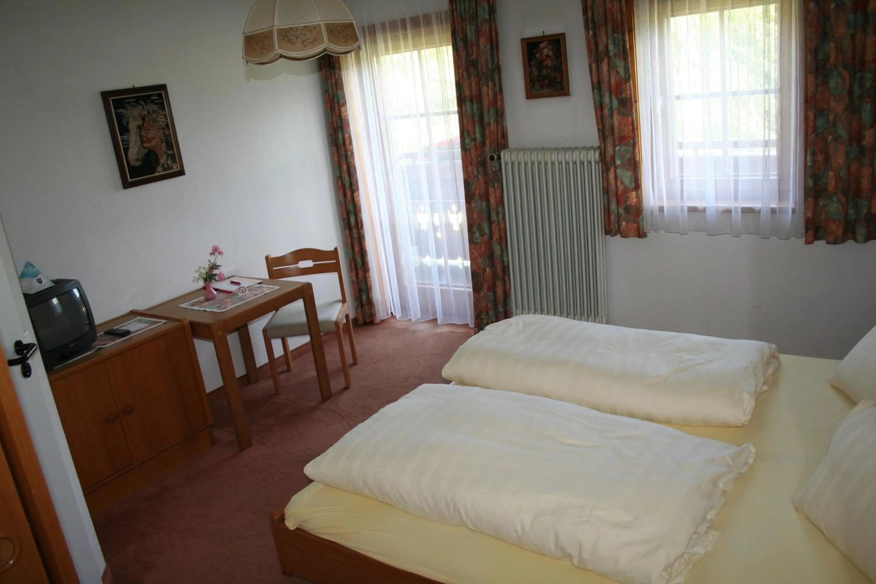 Bed in Hotel Gasthof Schweizerhaus