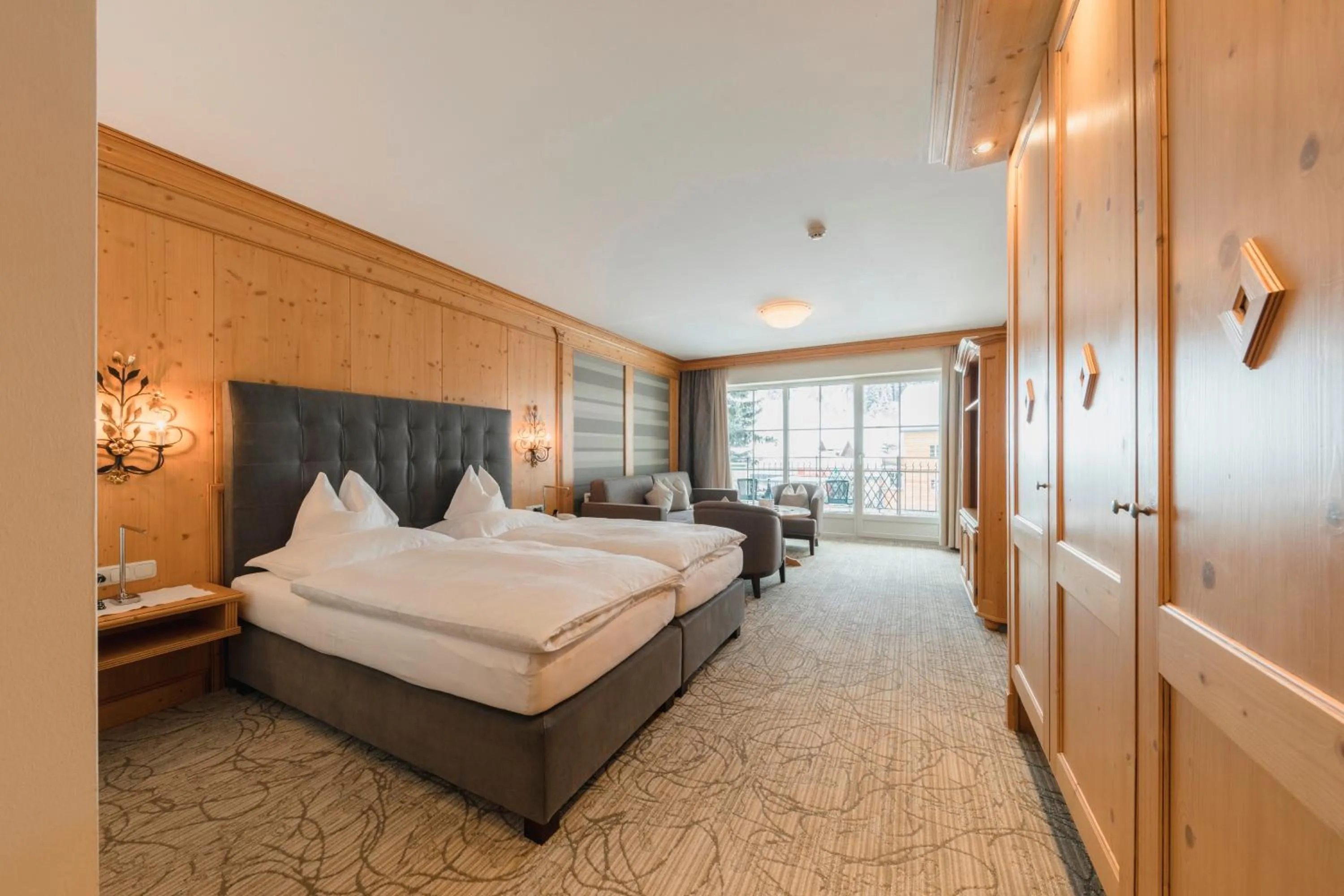 Photo of the whole room, Bed in Hotel Schwarzer Adler - Sport & Spa