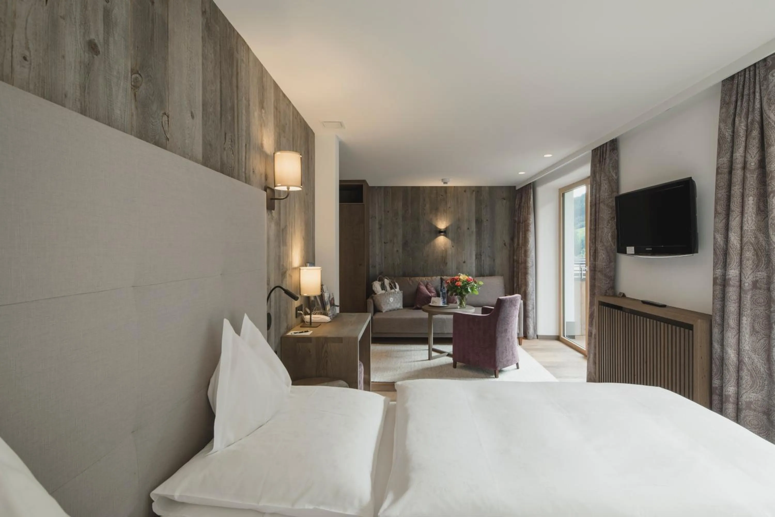 Bedroom, Bed in Hotel Schwarzer Adler - Sport & Spa